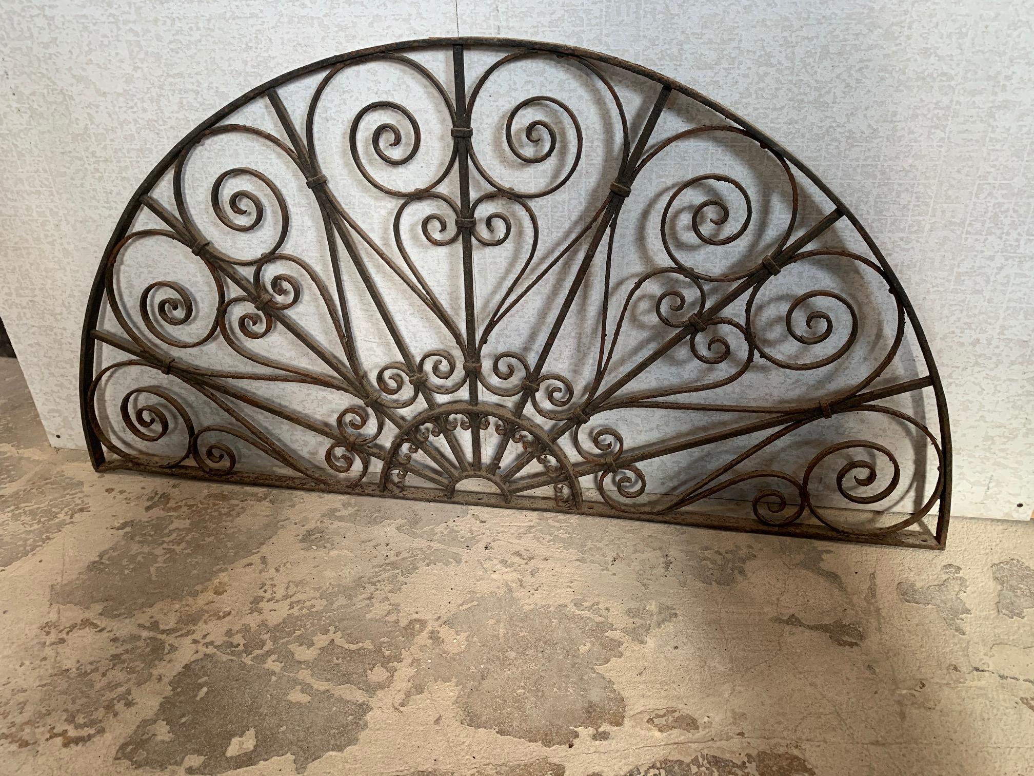 Arched ironwork features landed and riveted components. Metal work is structurally sound with no losses.
