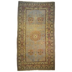 19th Century Yellow, Violet and Pink Khotan Medallions Rug, circa 1870