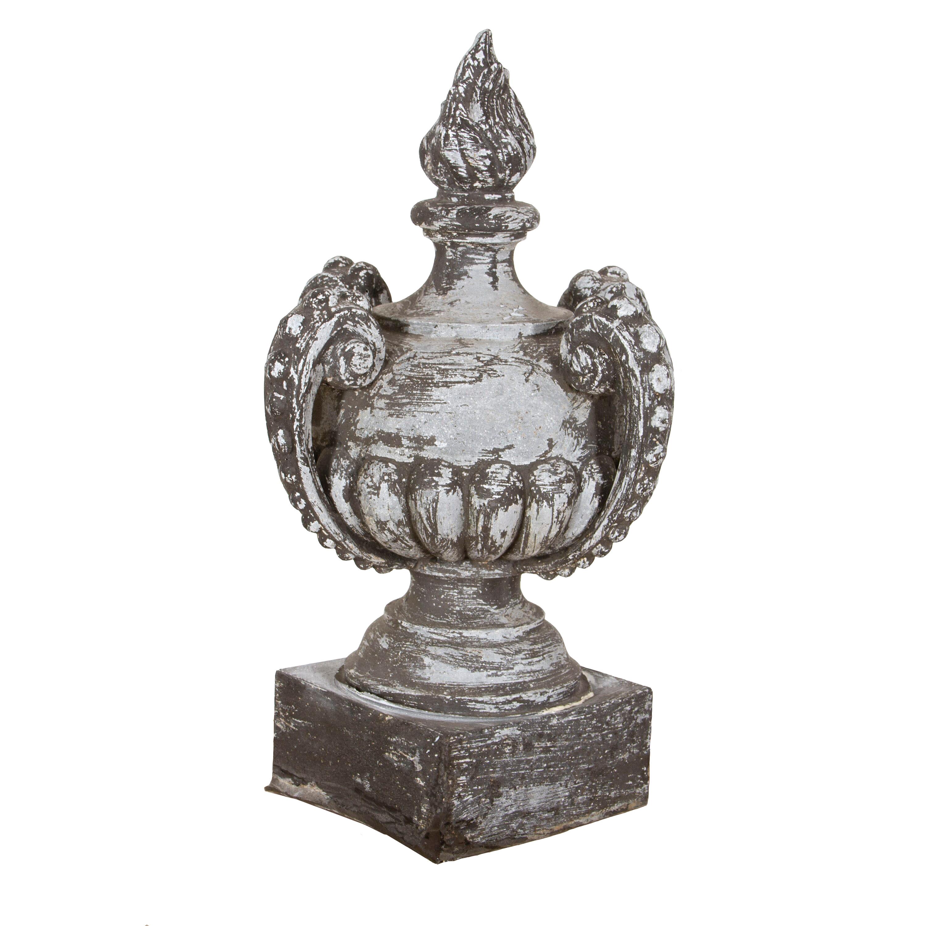 Charming 19th century zinc finial. 
This decorative finial features a detailed flame top with three curved arms and a shapely body. Terminating on a square zinc base. 
A decorative addition that will make for a great feature indoors as well as