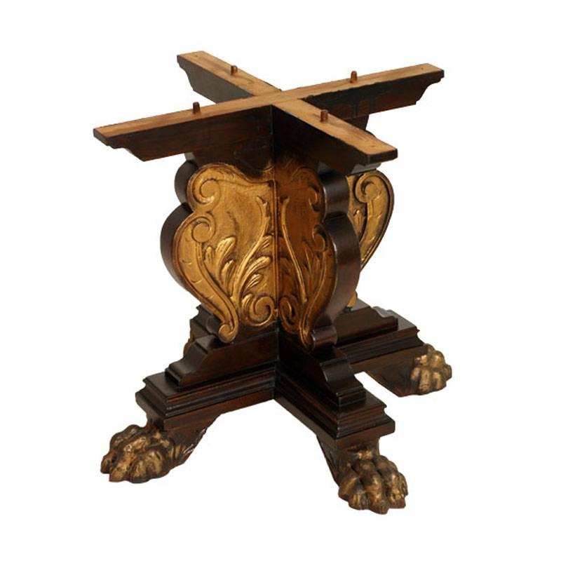 Tuscany massive late 19th century Renaissance table in ebonized solid walnut, carved with gold decorations. Octagonal top, central leg with double ace of cups, final part with a molded cross and lion's feet. Polished to wax.

Measures in cm: