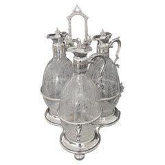 19th CenturyBritish Cut Crystal Mounted Silver Plated Cruet Set