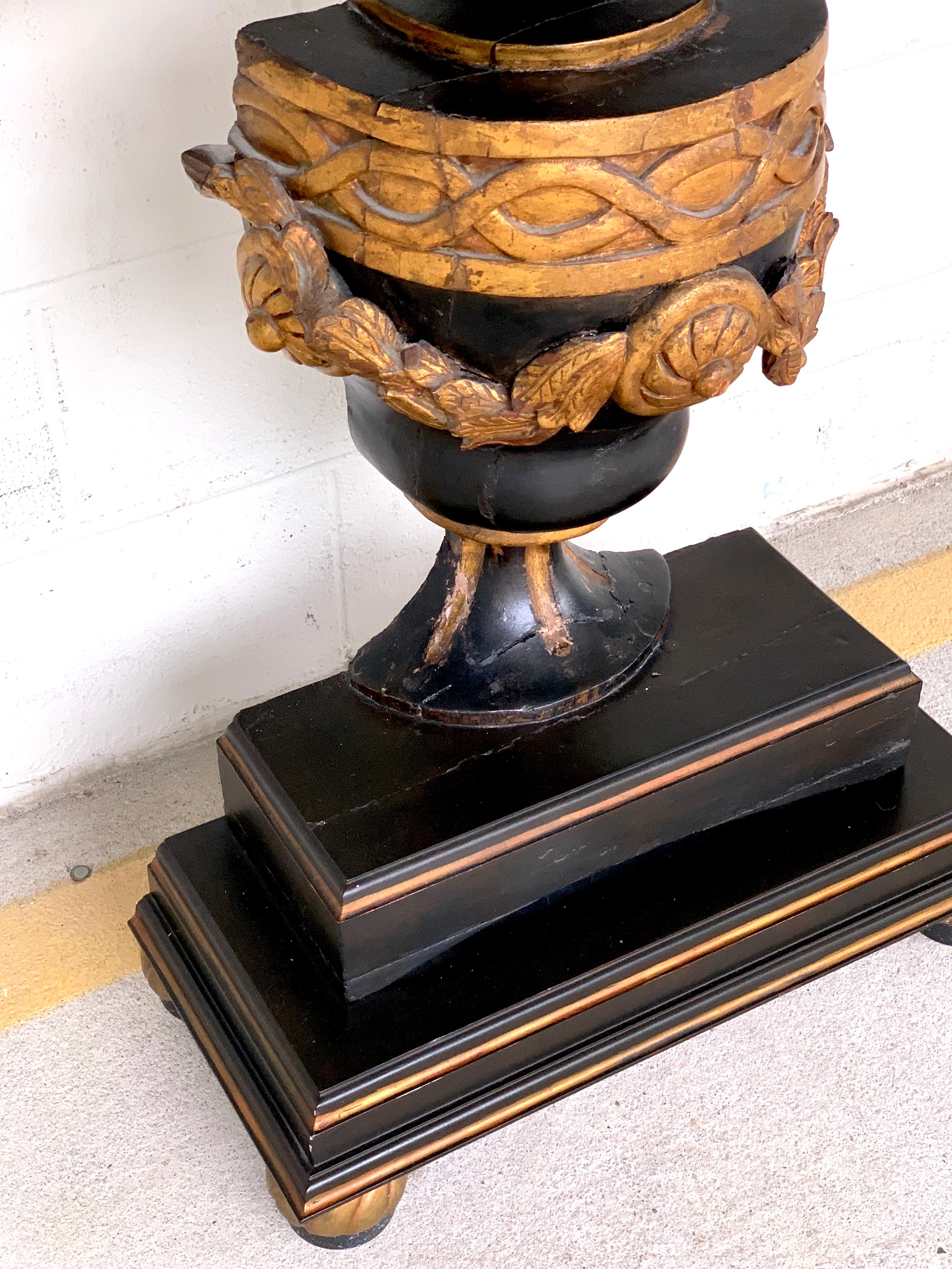 European 19th Continental Ebonized and Gilt Neoclassical Carved Urn Motif Console 