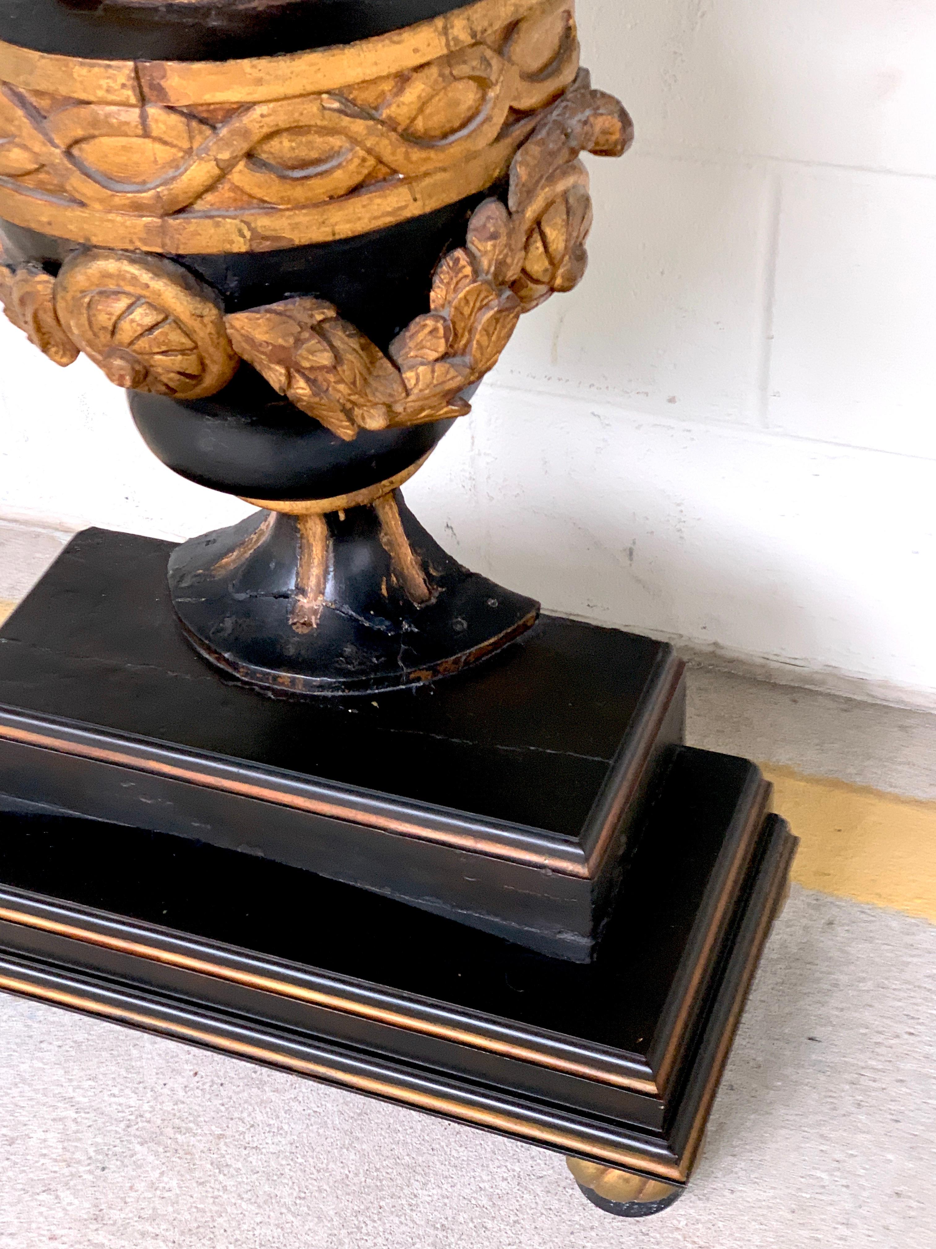 Walnut 19th Continental Ebonized and Gilt Neoclassical Carved Urn Motif Console 