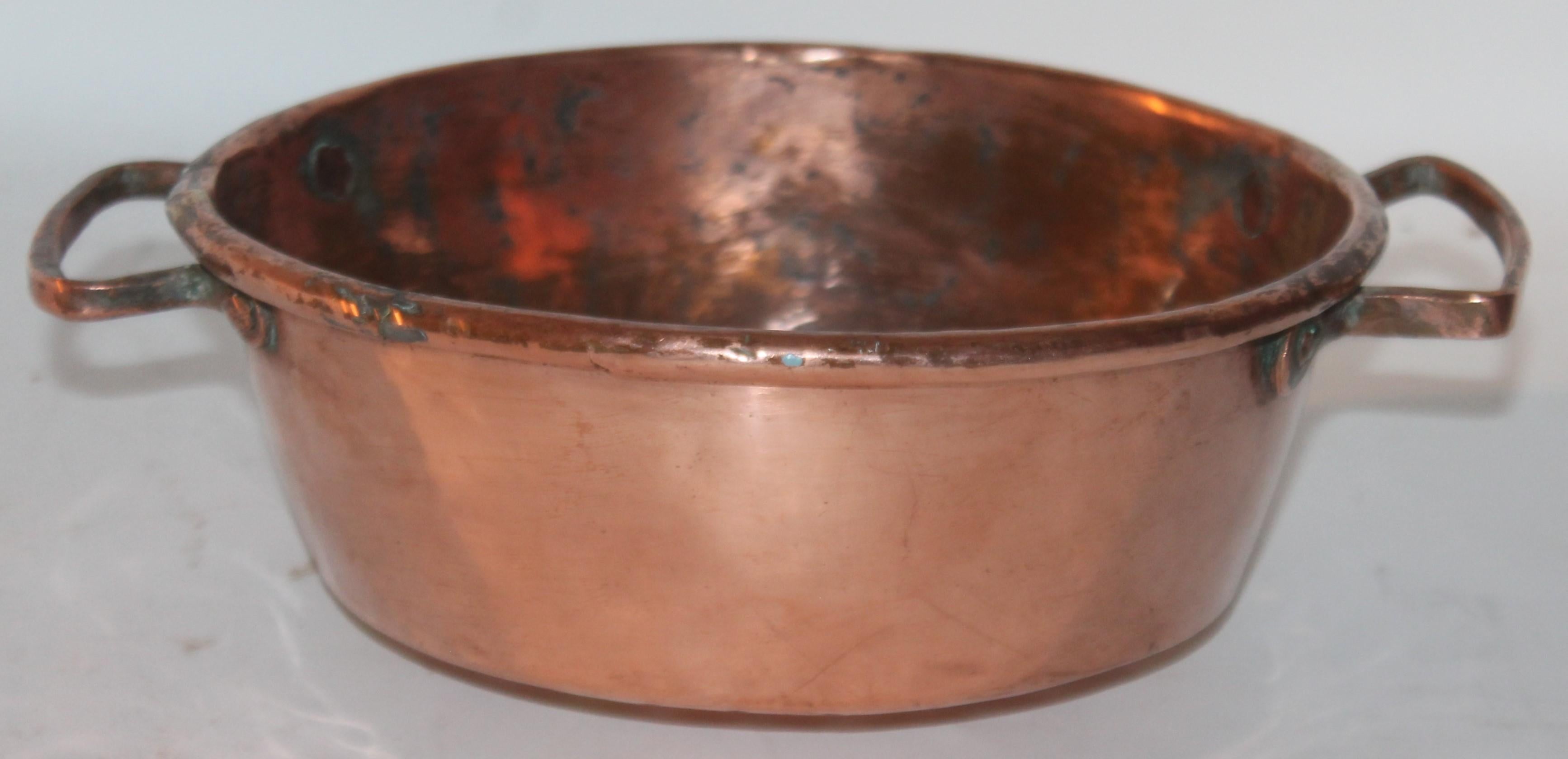 19th century amazing copper stainer with double handles and handmade. The condition is very good.