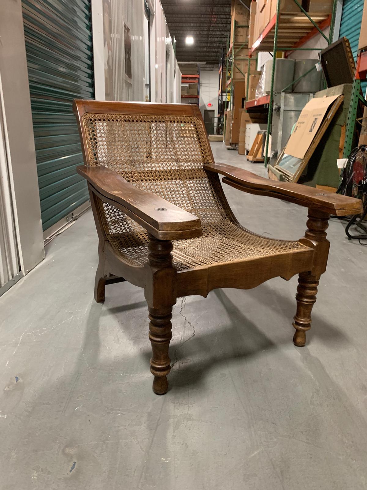 19th-early 20th century Anglo-Caribbean caned planters chair with leg stretchers
Measures: 29.75