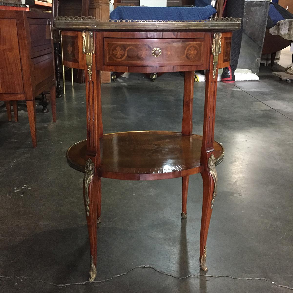 19th-early 20th century French inlaid side table with flowers, marble top and gallery.