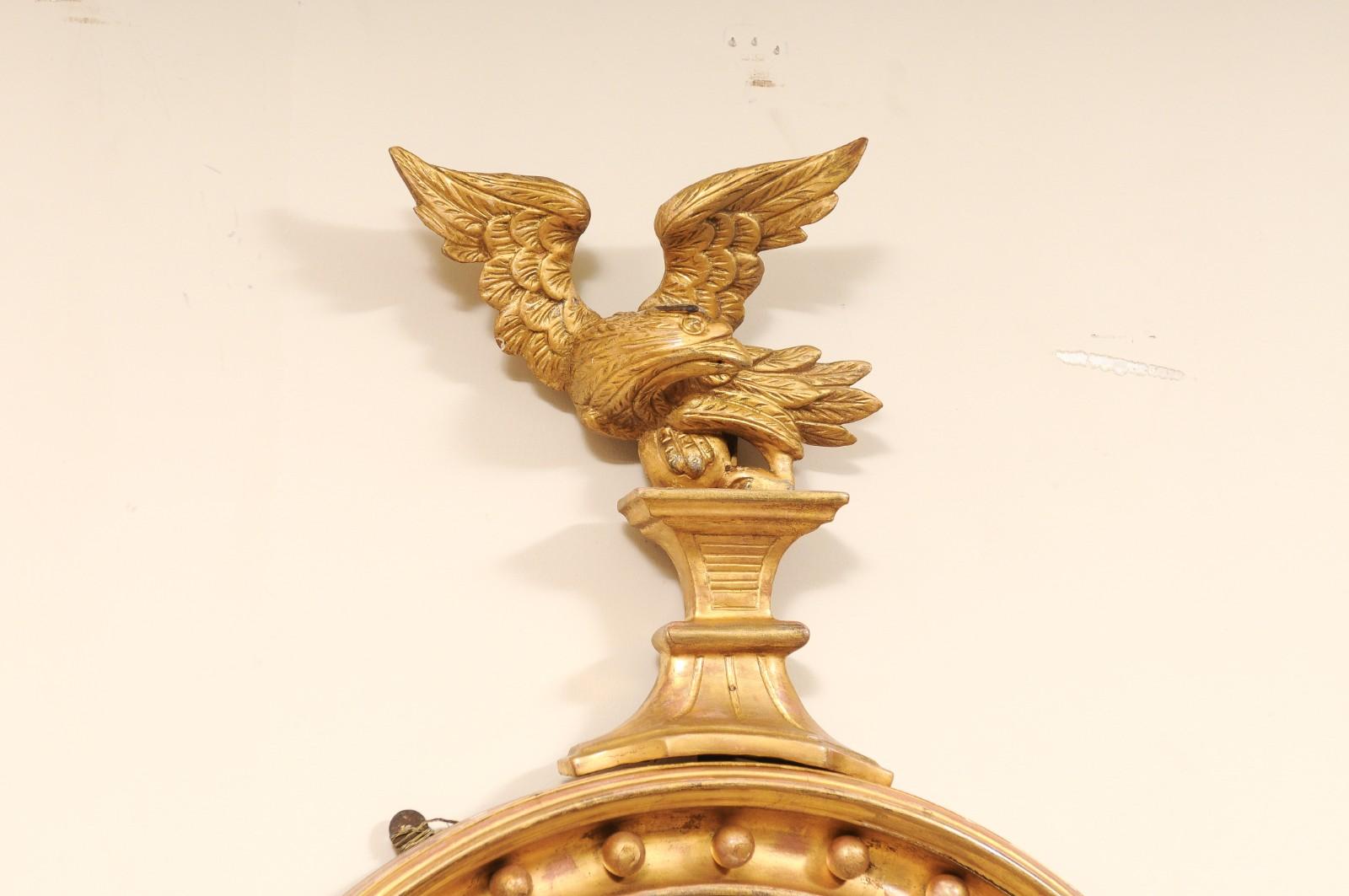 Hand-Carved 19th English Regency Bullseye Convex Giltwood Frame Mirror with Eagle For Sale