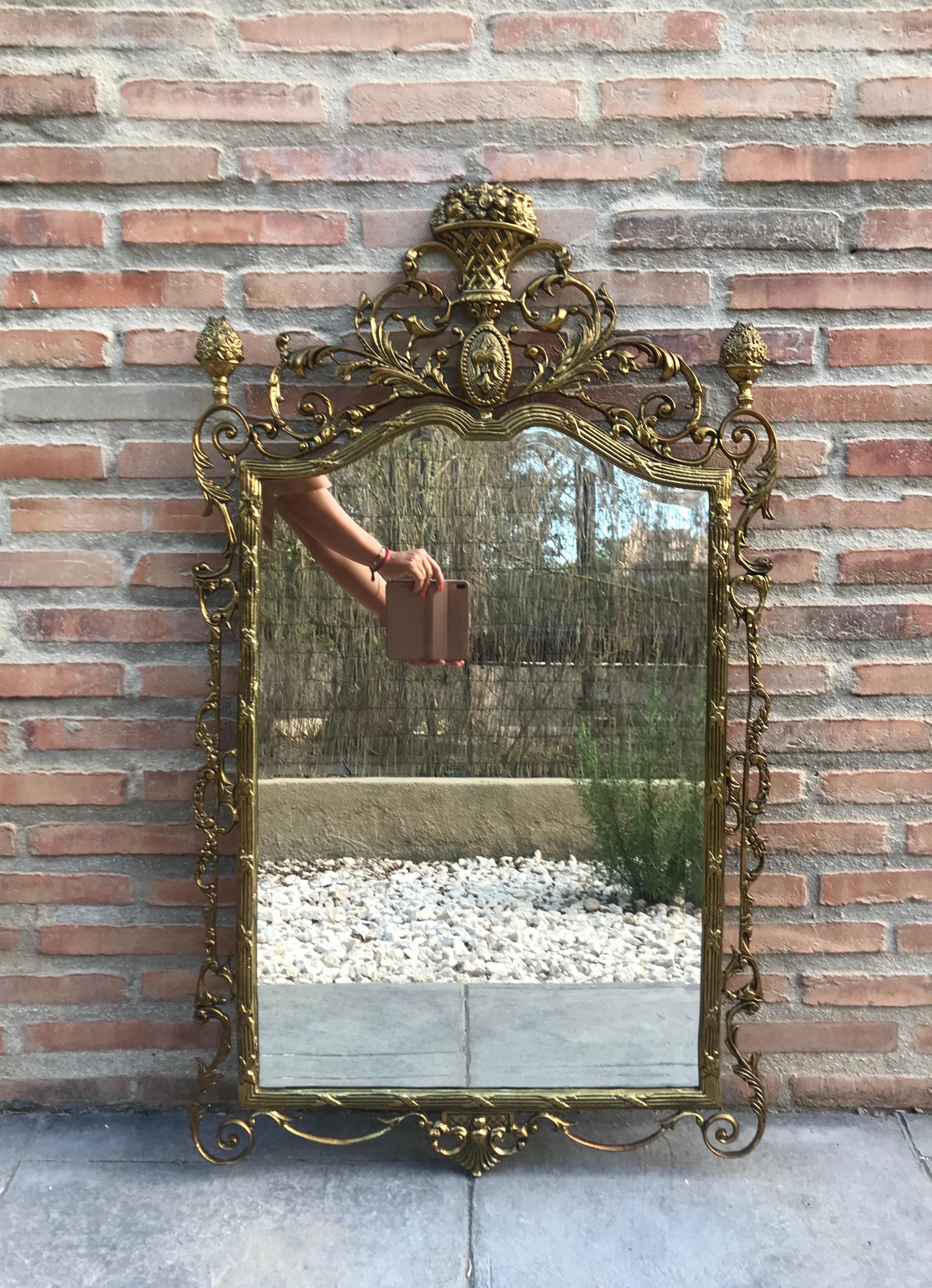 19th century French handmade bronze mirror with reliefs.