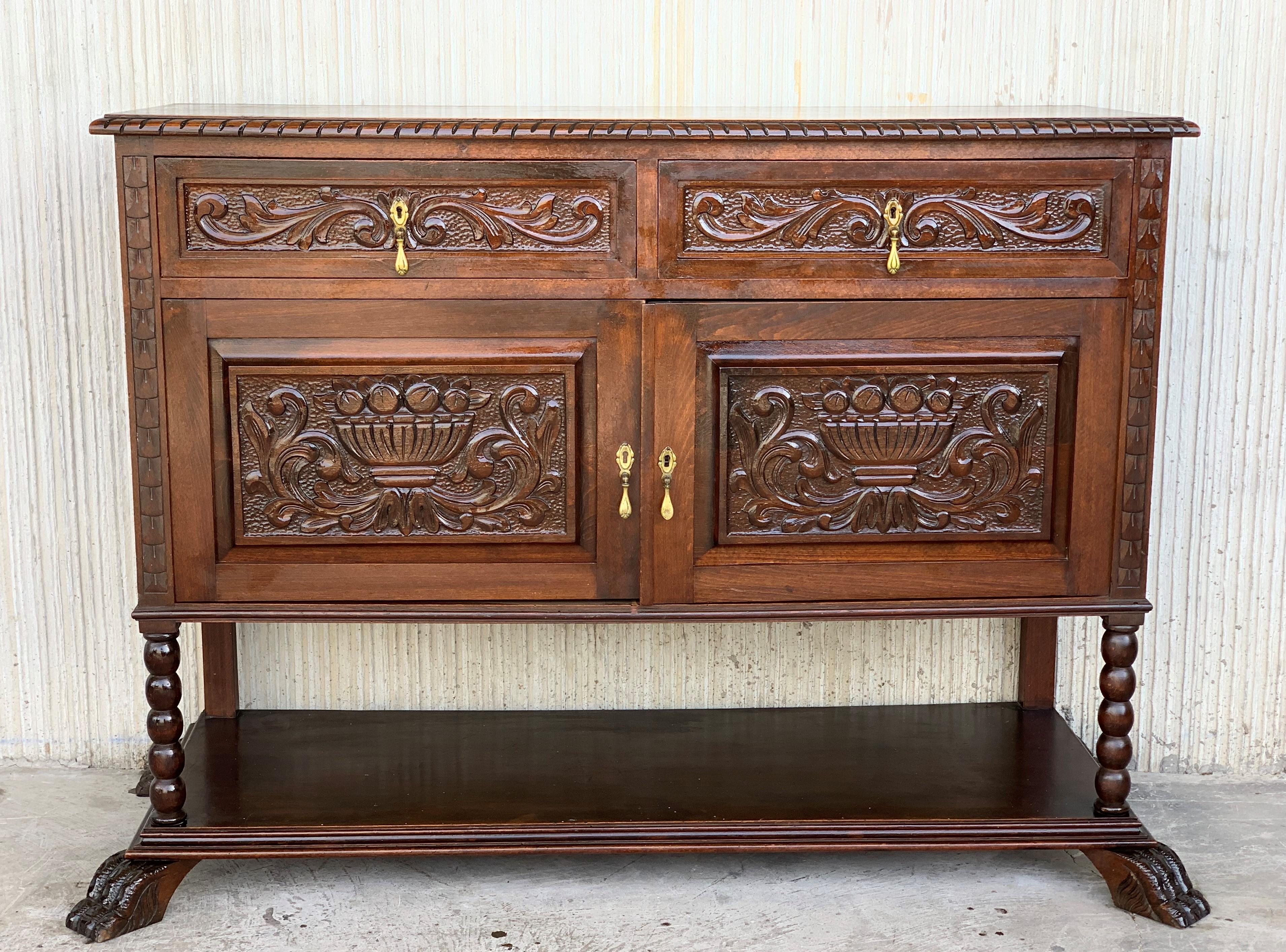19th French carved walnut sideboard, cupboard, buffet or cabinet with two drawers, two doors and one low shelve.
 
