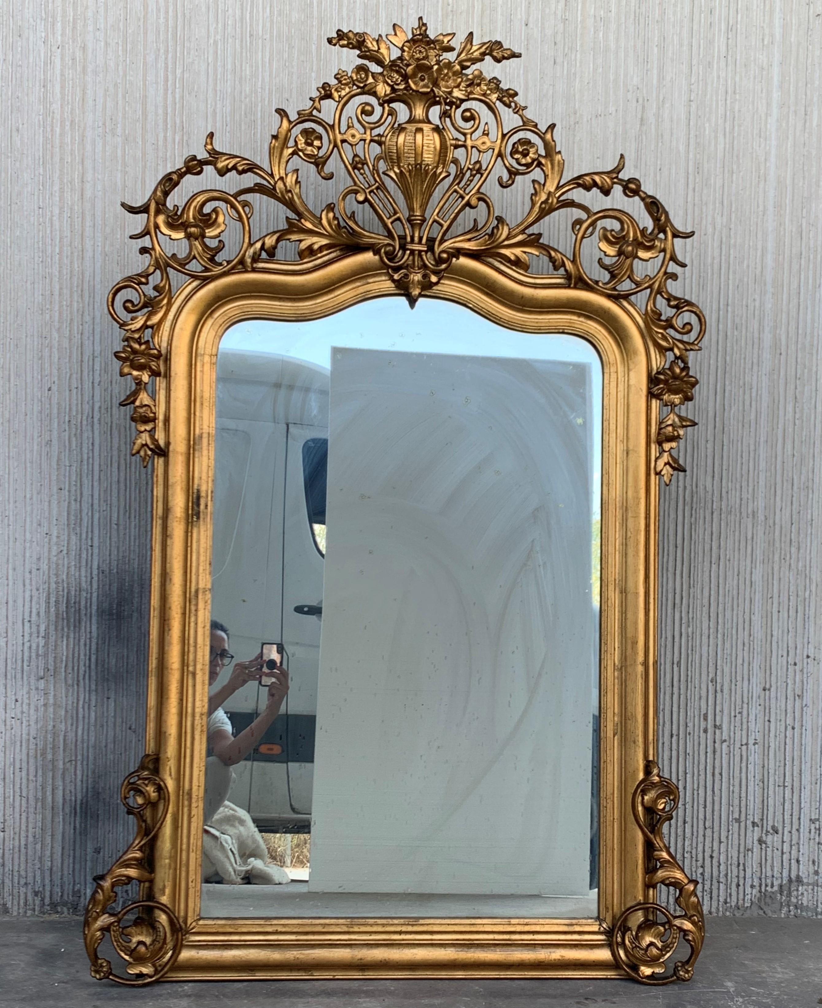 19th century French Empire period carved giltwood rectangular mirror
An exceptional matched hand carved and gilded Italian mirror. Highly carved with flowers, original glass and original wood backs, France, 19th century.