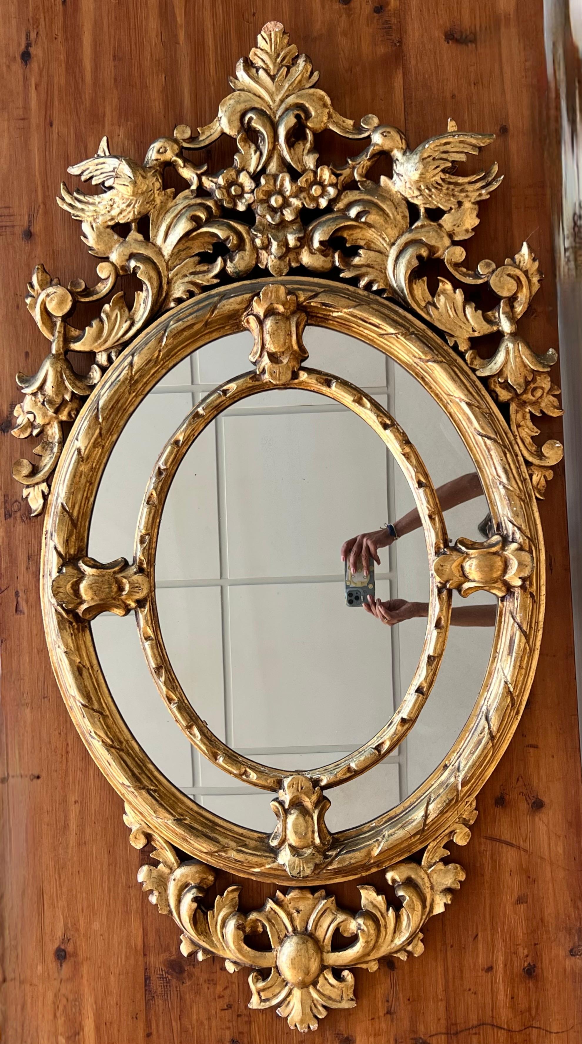 19th French Empire period gilt wood oval mirror 