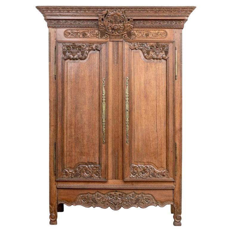 19th French Provincial Carved Oak Armoire For Sale