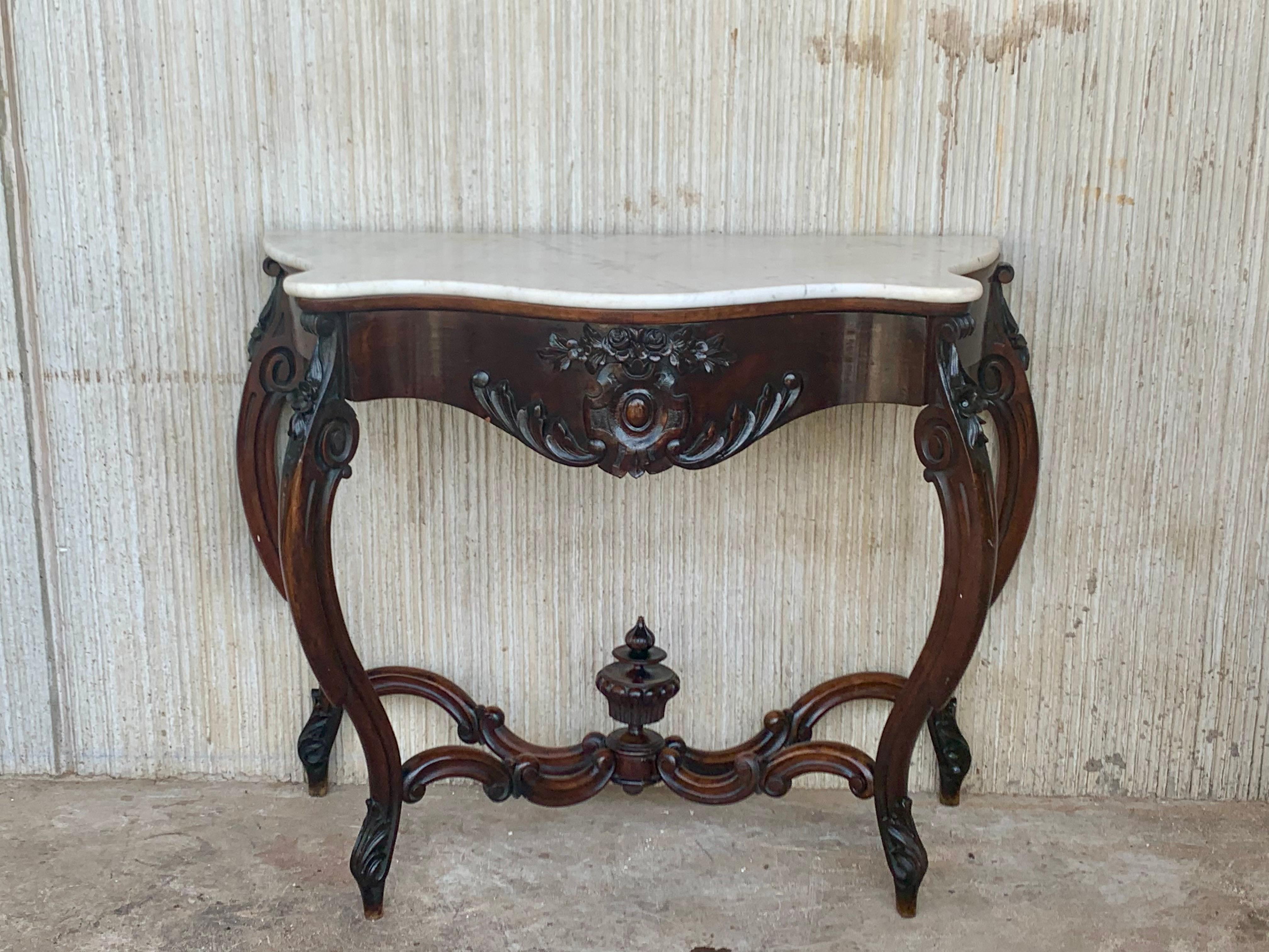19th French Regency carved walnut console table with drawer & marble top

19th century French Regence style beautifully carved with leaves walnut console. White cream marble top with front drawer, over hand-carved frieze supported by four cabriole