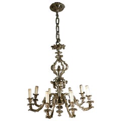 Lustre néoclassique en bronze argenté du XIXe siècle à huit lumières