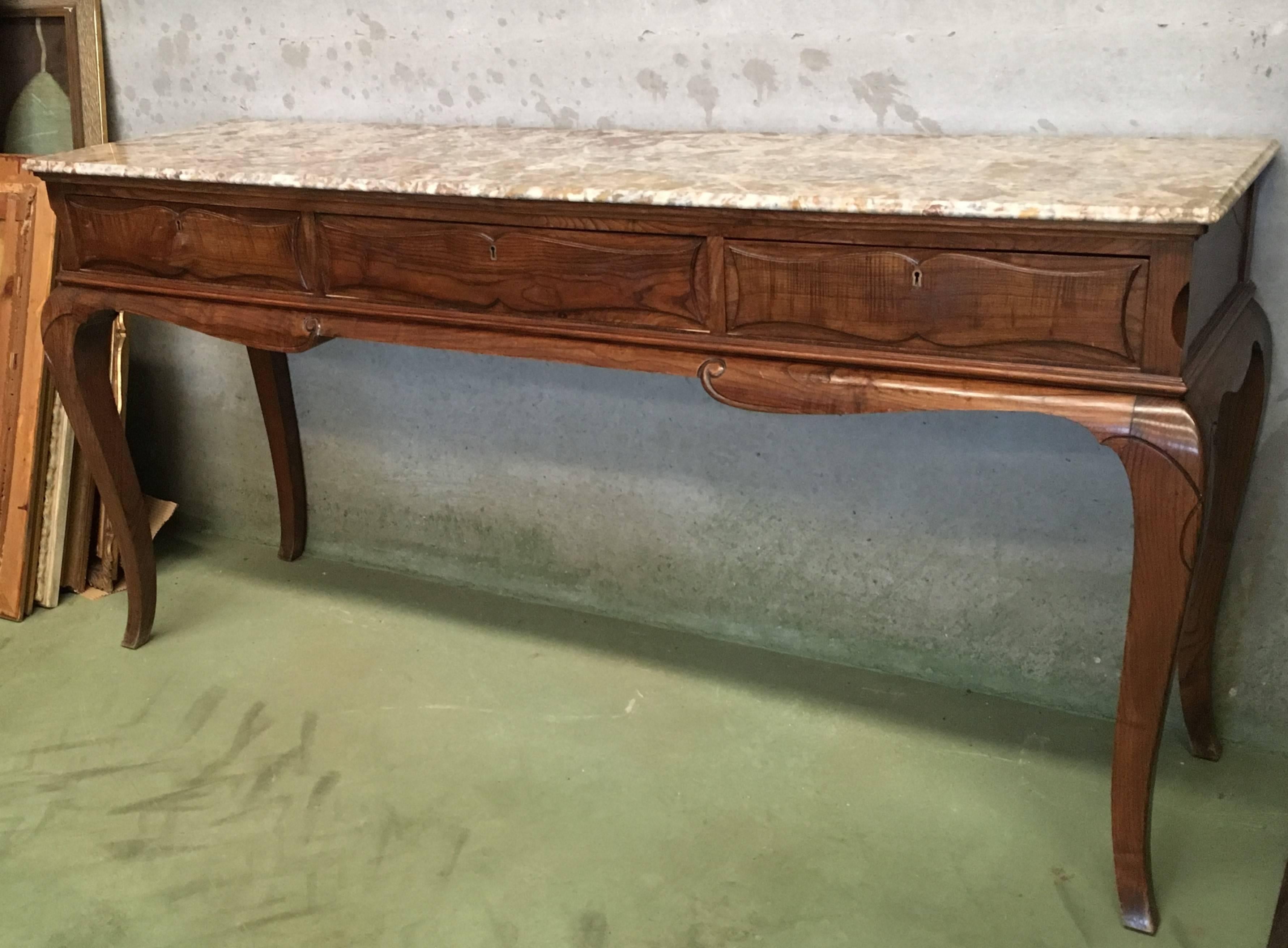 Elegant 19th French three drawers console table with top marble and cabriole legs.
  