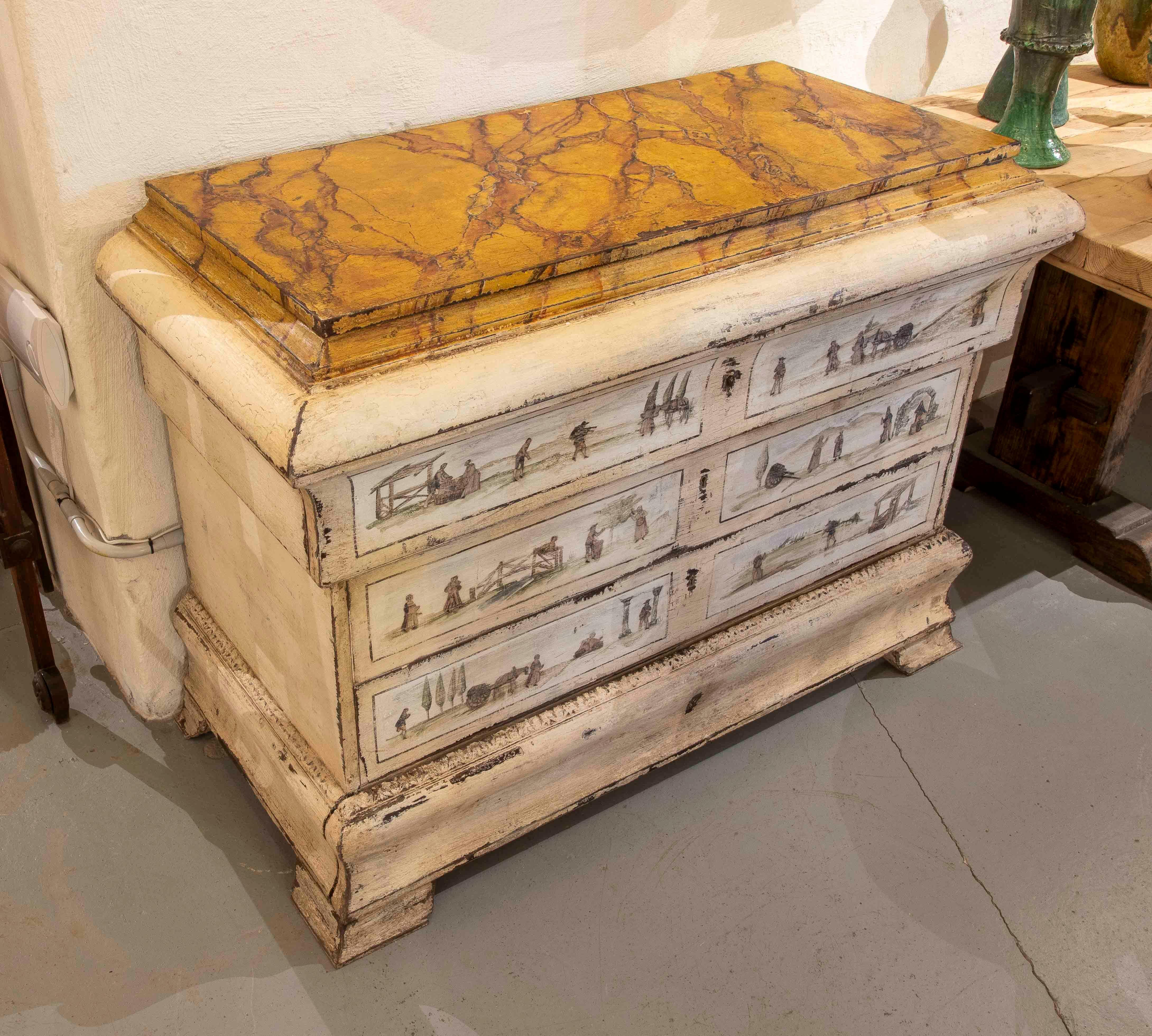 Charming 19th-century Italian chest of drawers, decorated with hand-painted scenes depicting rural landscapes and country life. The piece combines the simplicity of its solid wood structure with the delicate artwork of its drawers and sides,