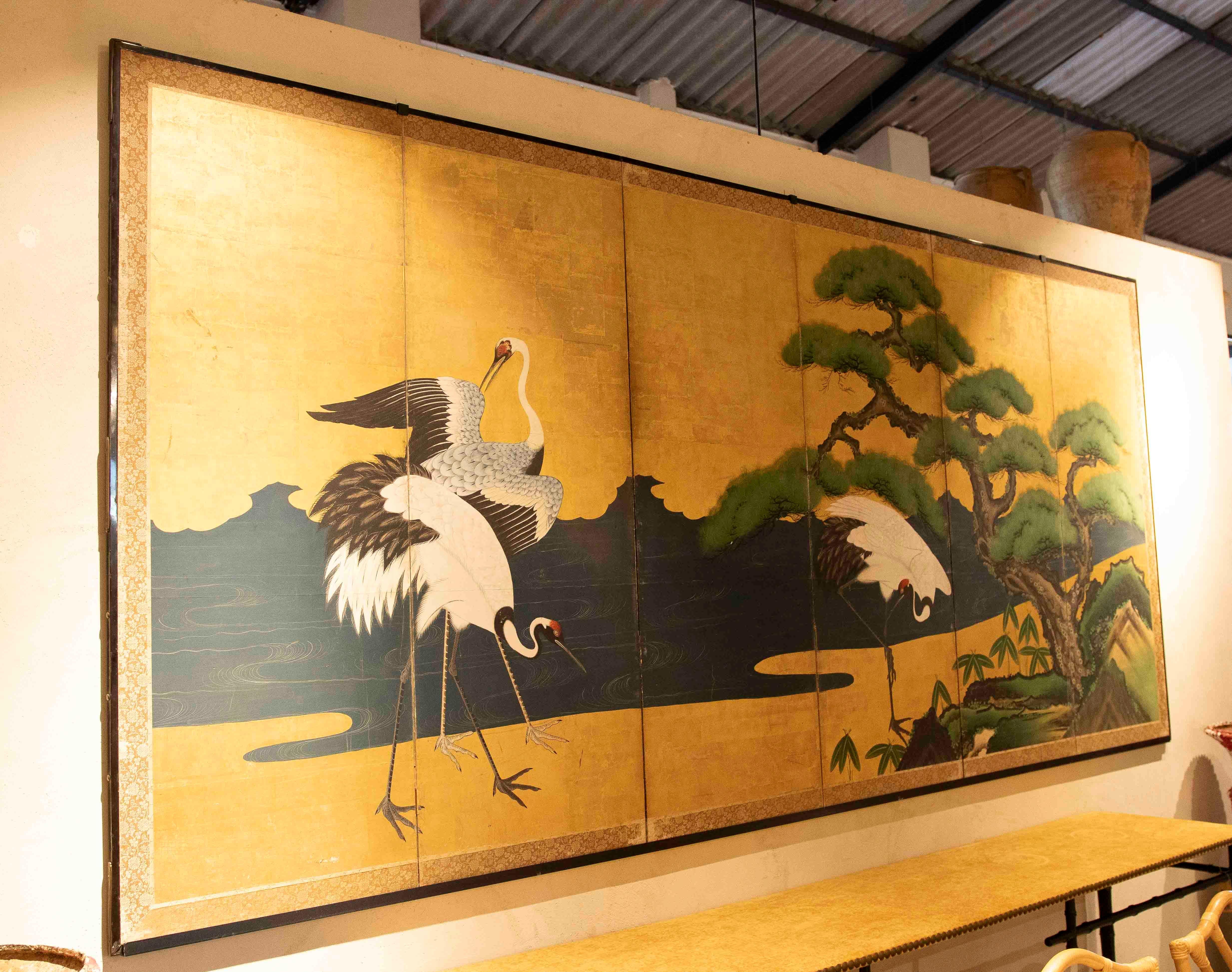 Hand-Painted 19th Japanese Screen with Cranes and Pine on a Golden Background For Sale