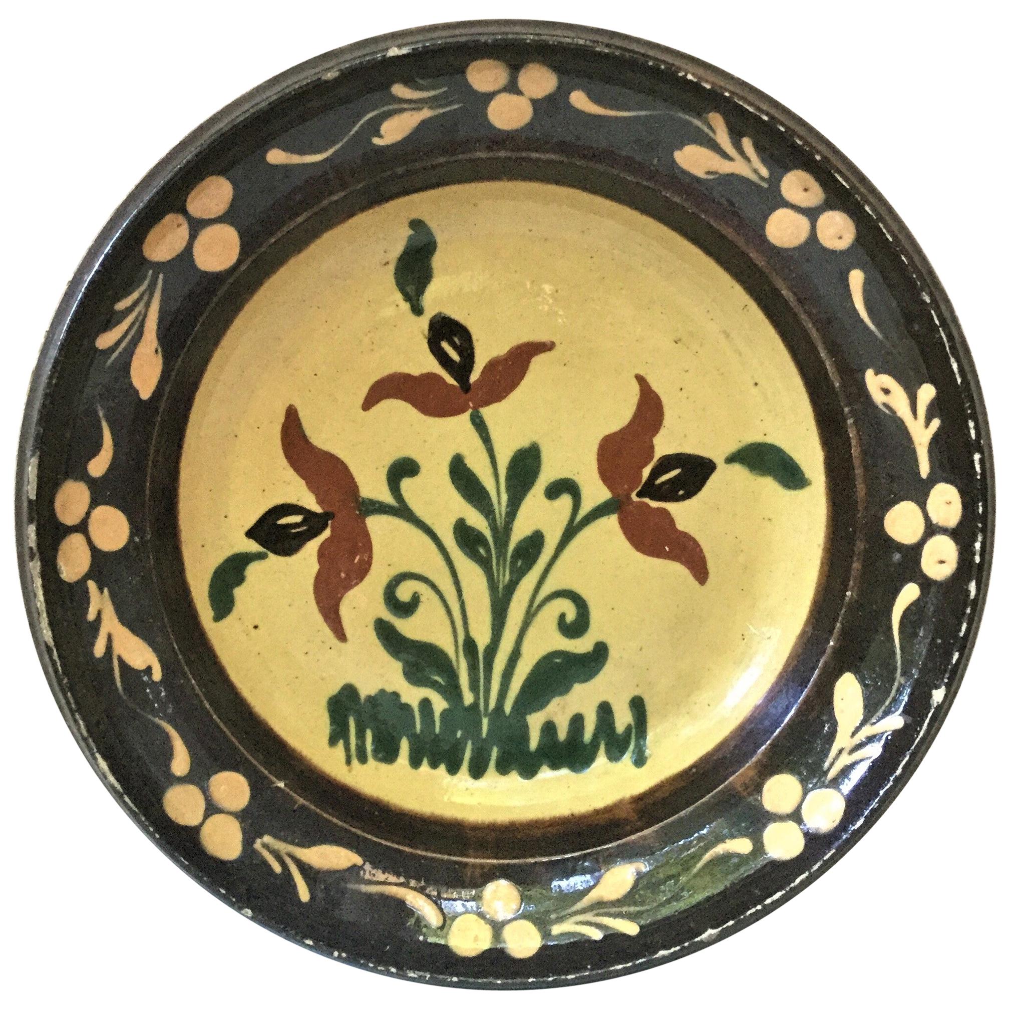 Grand plat à fleurs Savoie en poterie française du 19ème siècle