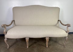 Sillón de lino estilo Luis XV del siglo XIX