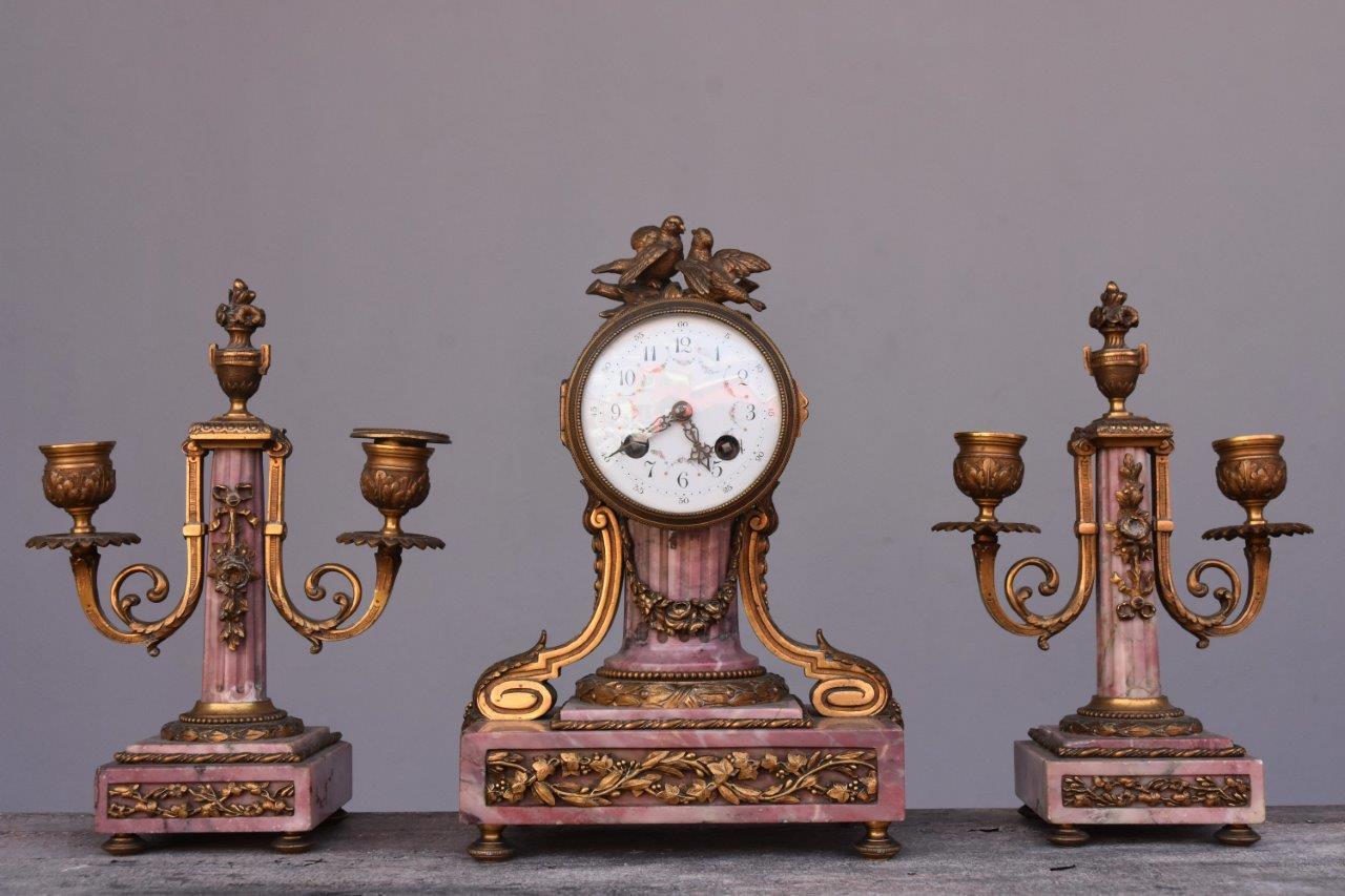 19th Louis XVI style marble mantel clock with gilt bronze.