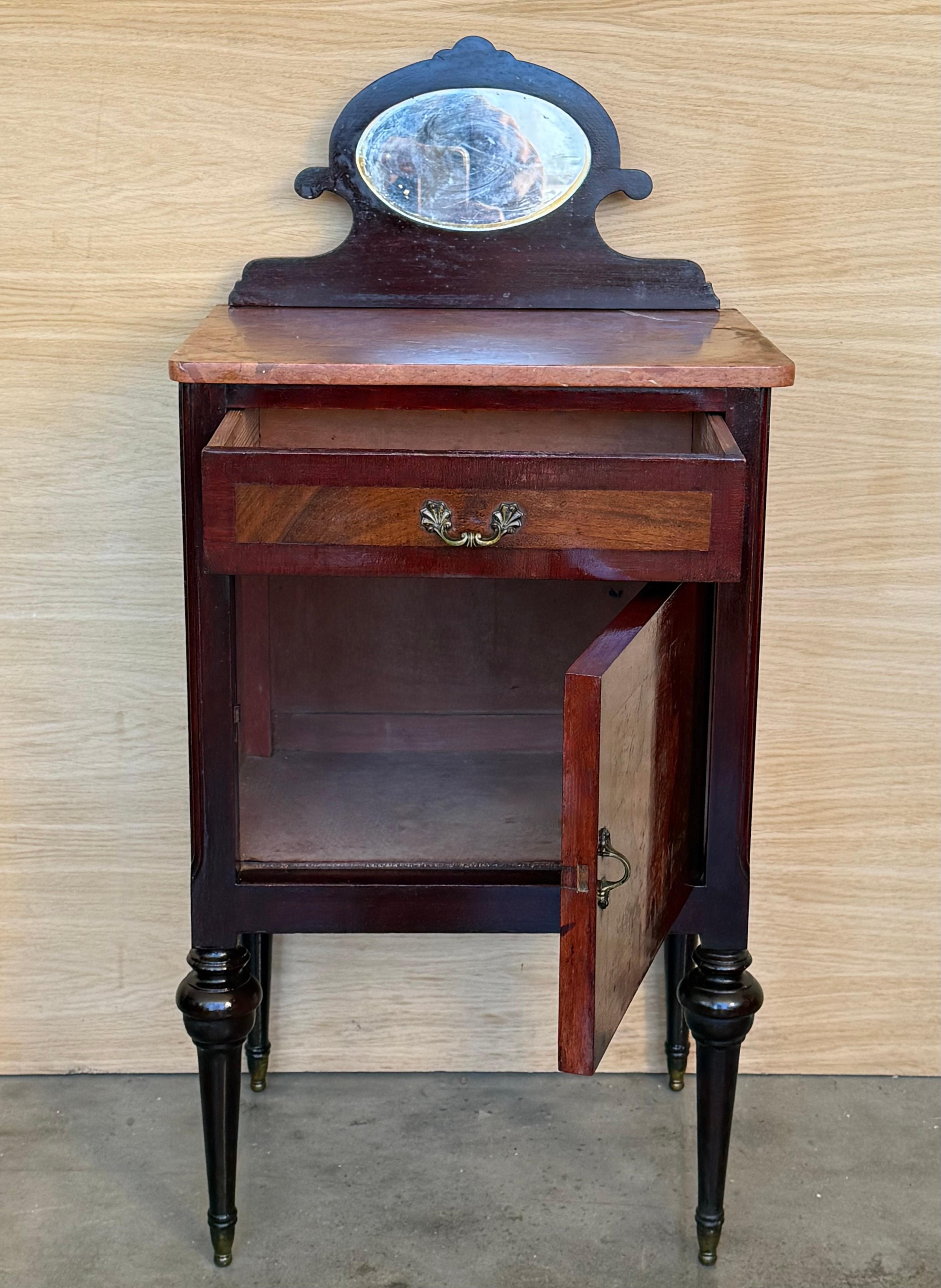 Français 19th Louis XVI Style Pair of Marquetry Nightstands with Bronze & Mirror Crest en vente