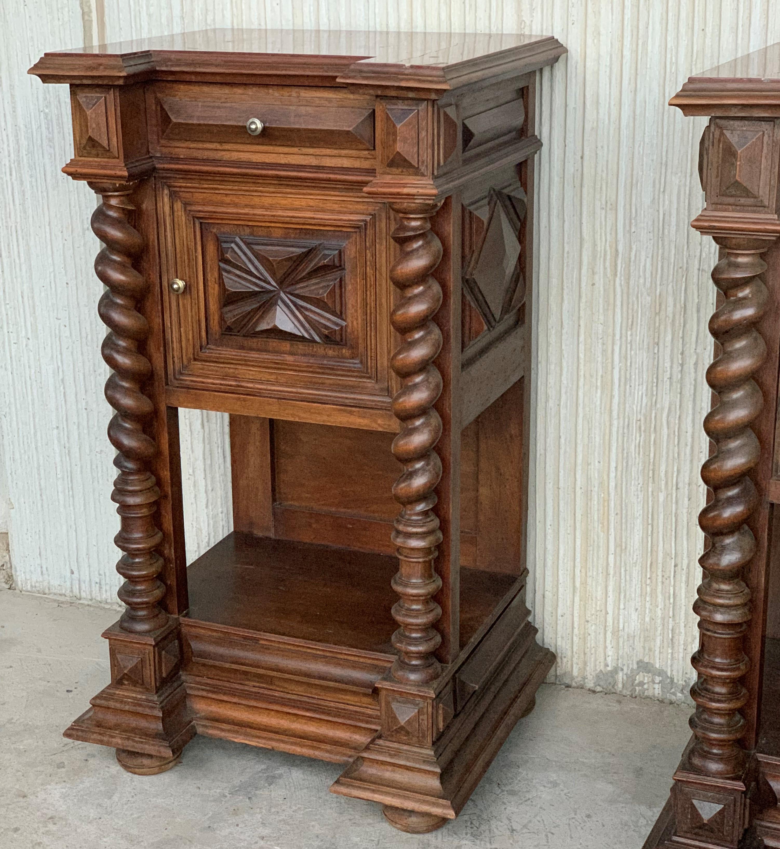 19th century pair of solid carved Brutalist French nightstands with Solomonic columns
it has one drawer and one compartment Mable covered.