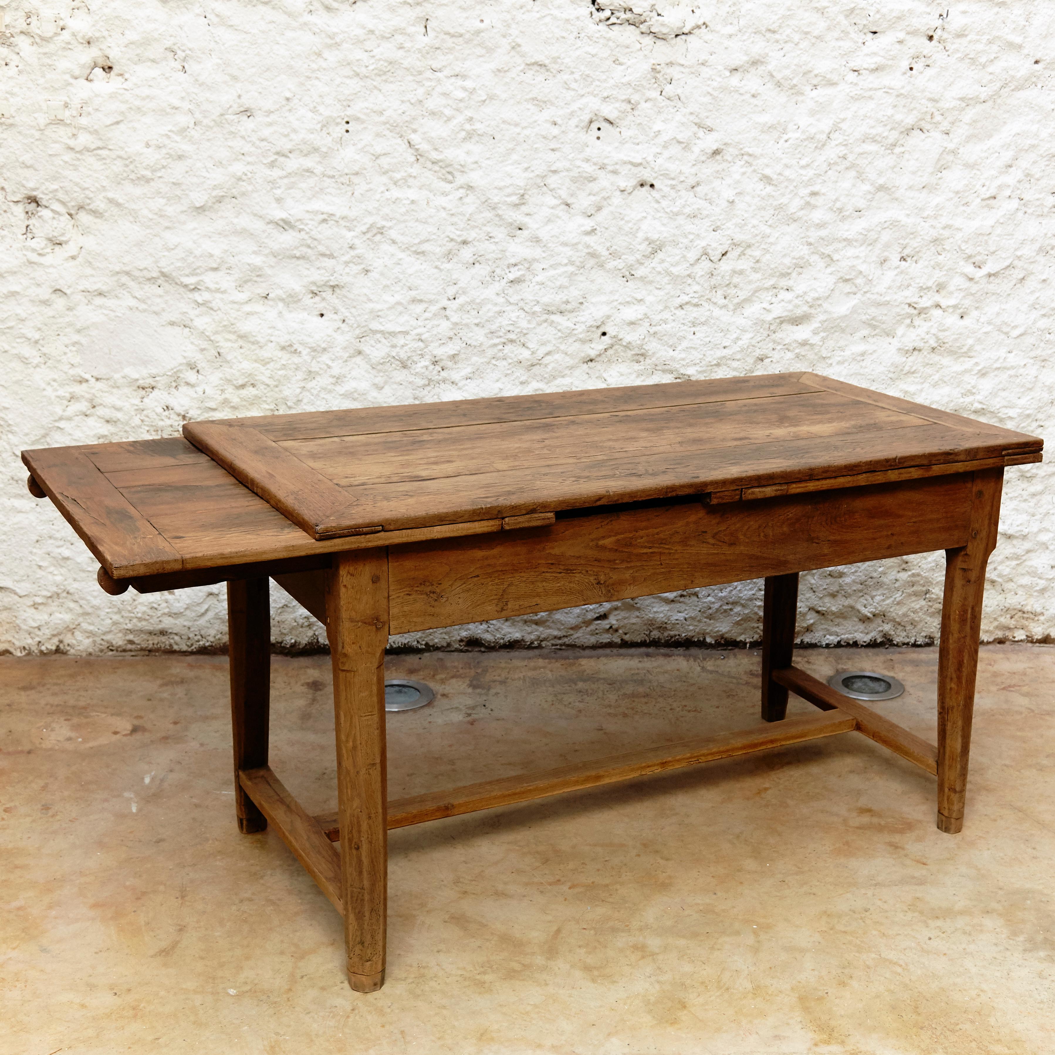 19th century rustic extensible popular oak dining table

In original condition with minor wear consistent of age and use, preserving a beautiful patina.

Measurements: 
Closed H82 x W143 x D74 cm
Open H82 x W280 x D74 cm.