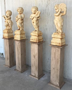 19th Set of Four Cast Iron Fiske Cherubs Boy Garden Statues with Stands