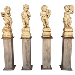 19th Set of Four Cast Iron Fiske Cherubs Boy Garden Statues with Stands