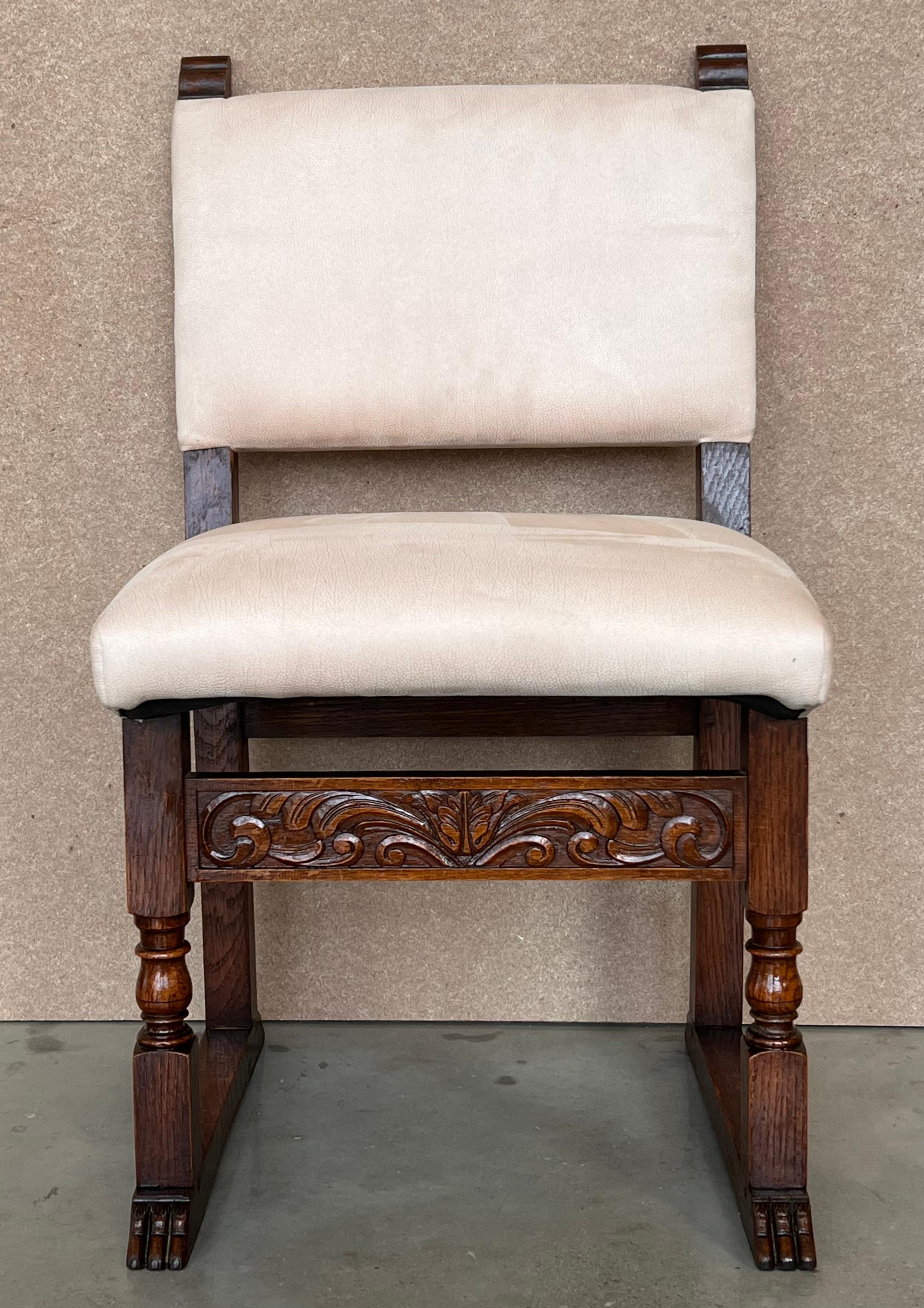 Set of 6 Spanish carved walnut dining chairs with upholstered seat and back.