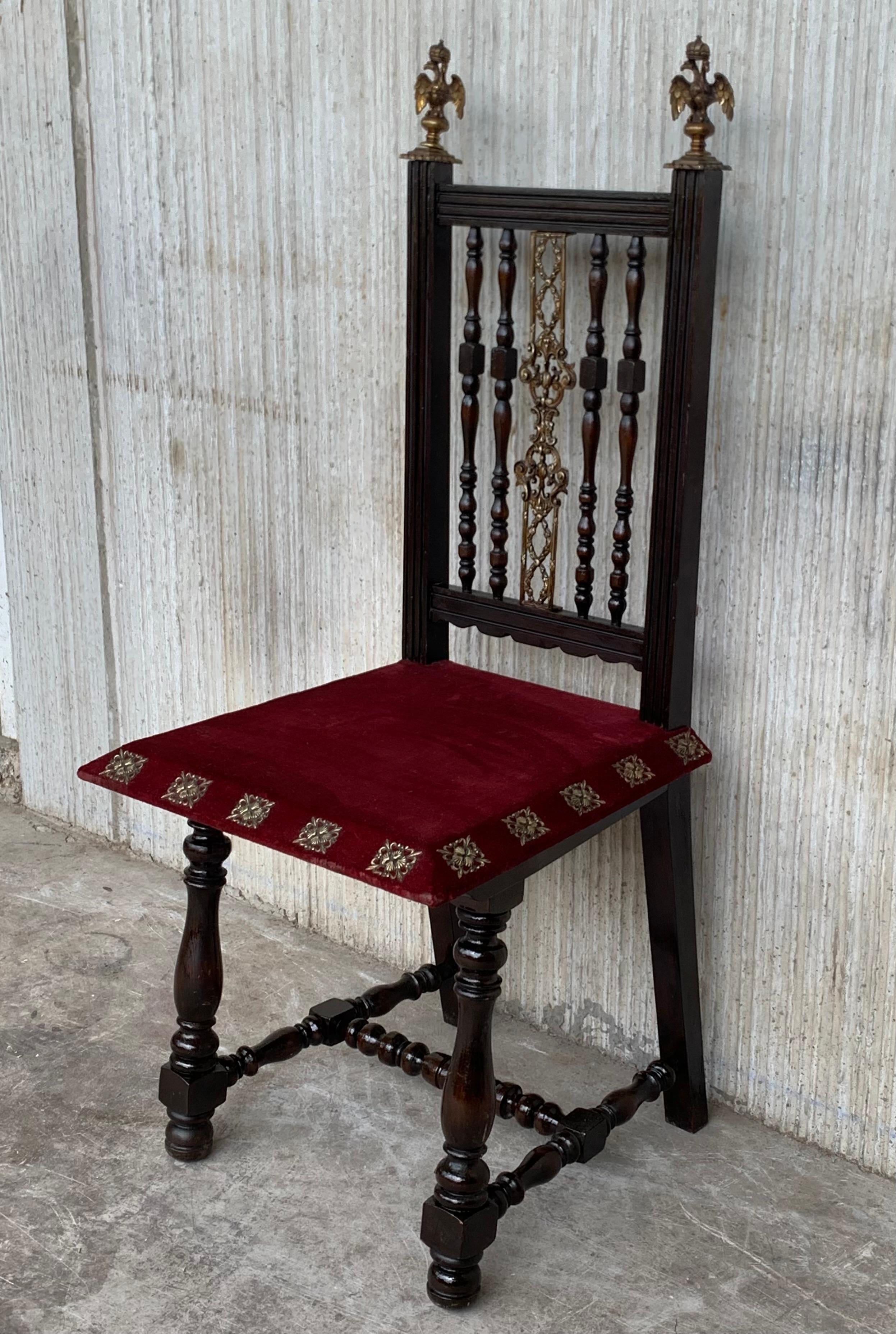 19th set of six Spanish chairs with bronze details and red velvet upholstery.
 
   