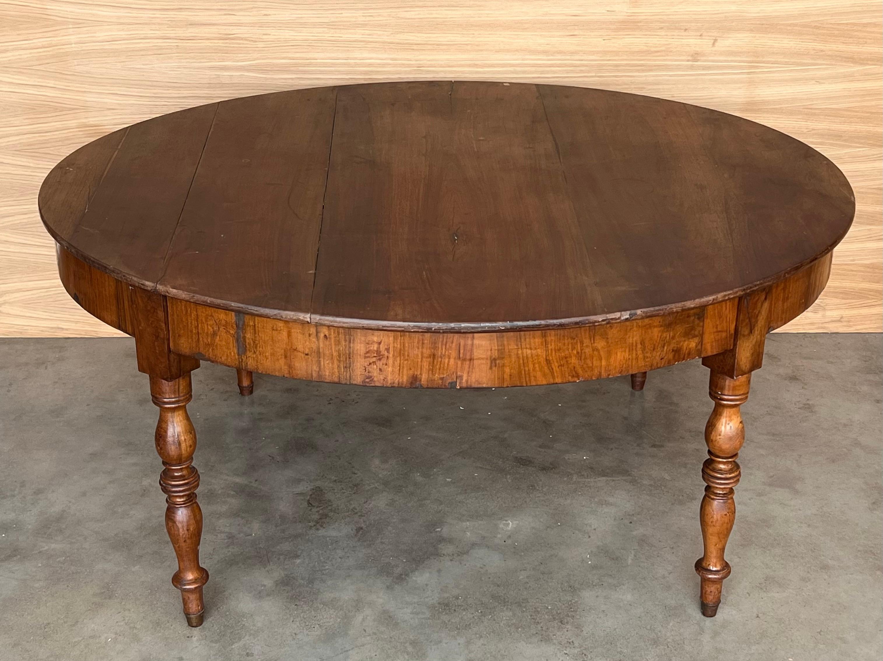 19th Century 19th Solid Walnut Oval Center Country Table with turned legs, France For Sale