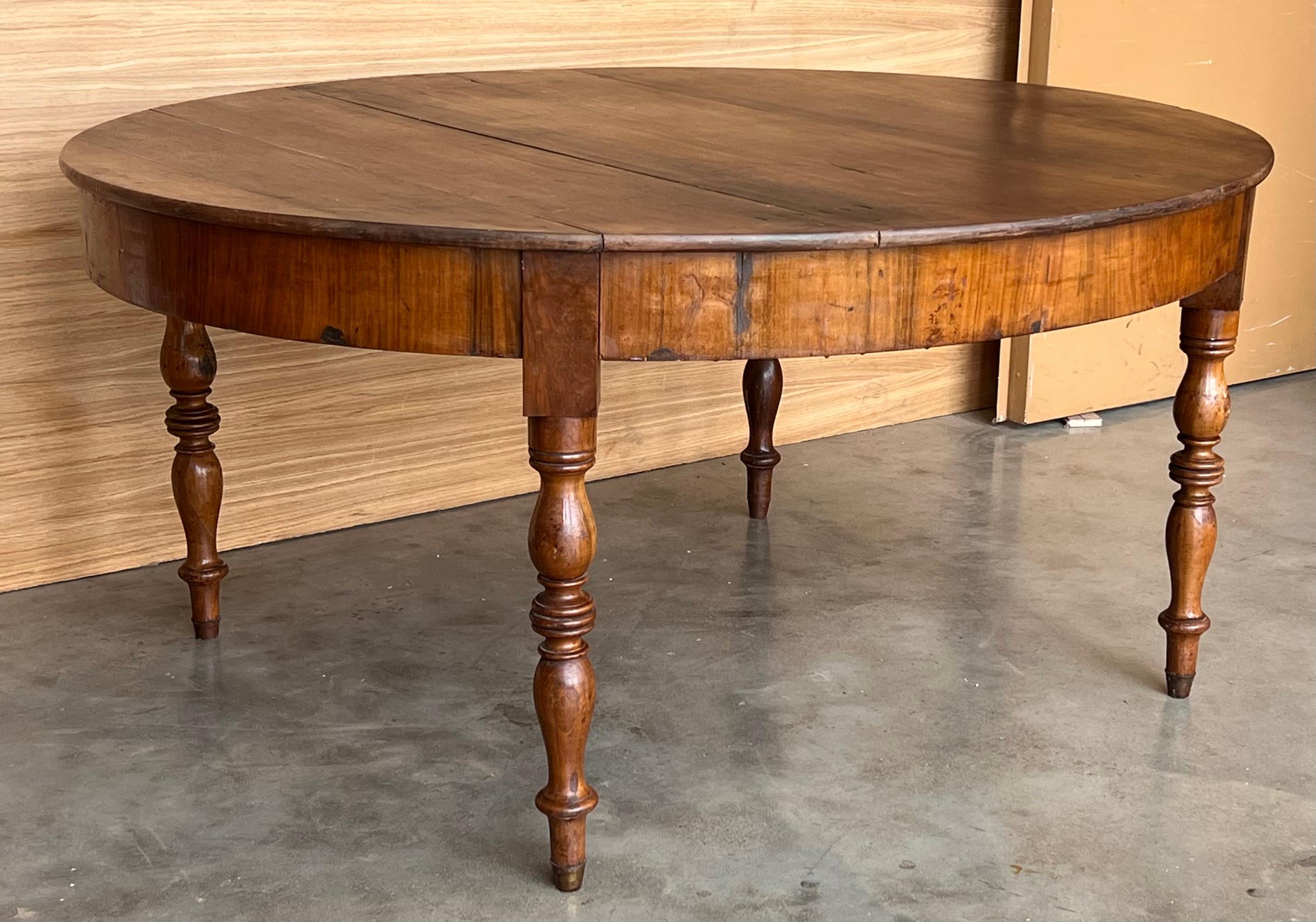 19th Solid Walnut Oval Center Country Table with turned legs, France For Sale 1