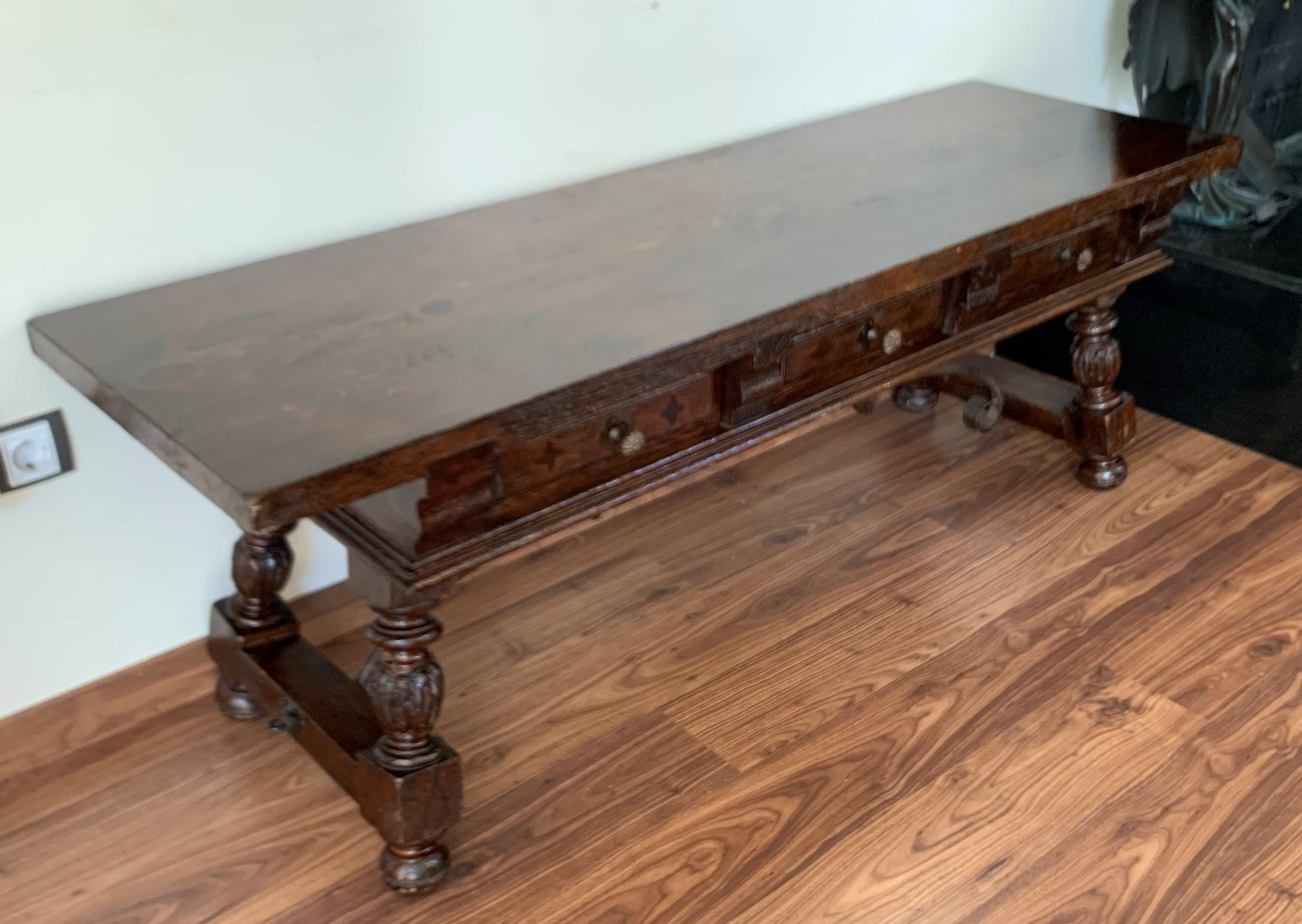 19th century Spanish bench or low console table with marquetry drawers
Original iron pull hardware and iron stretcher
That back has the same picture than the front (without drawers).