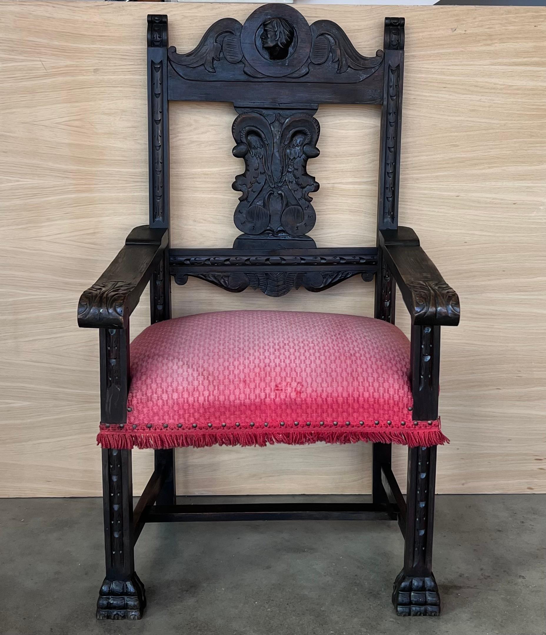 19th century Spanish colonial altar armchairs with red velvet  seat and back with ornamental carved on the back and beautiful legs and armchairs. There are a very resistant and heavy armchair.

Measures: Height to arms  26.57 in