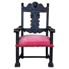 XIX Sillón colonial español de altar tallado con asiento de terciopelo rojo y respaldo tallado
