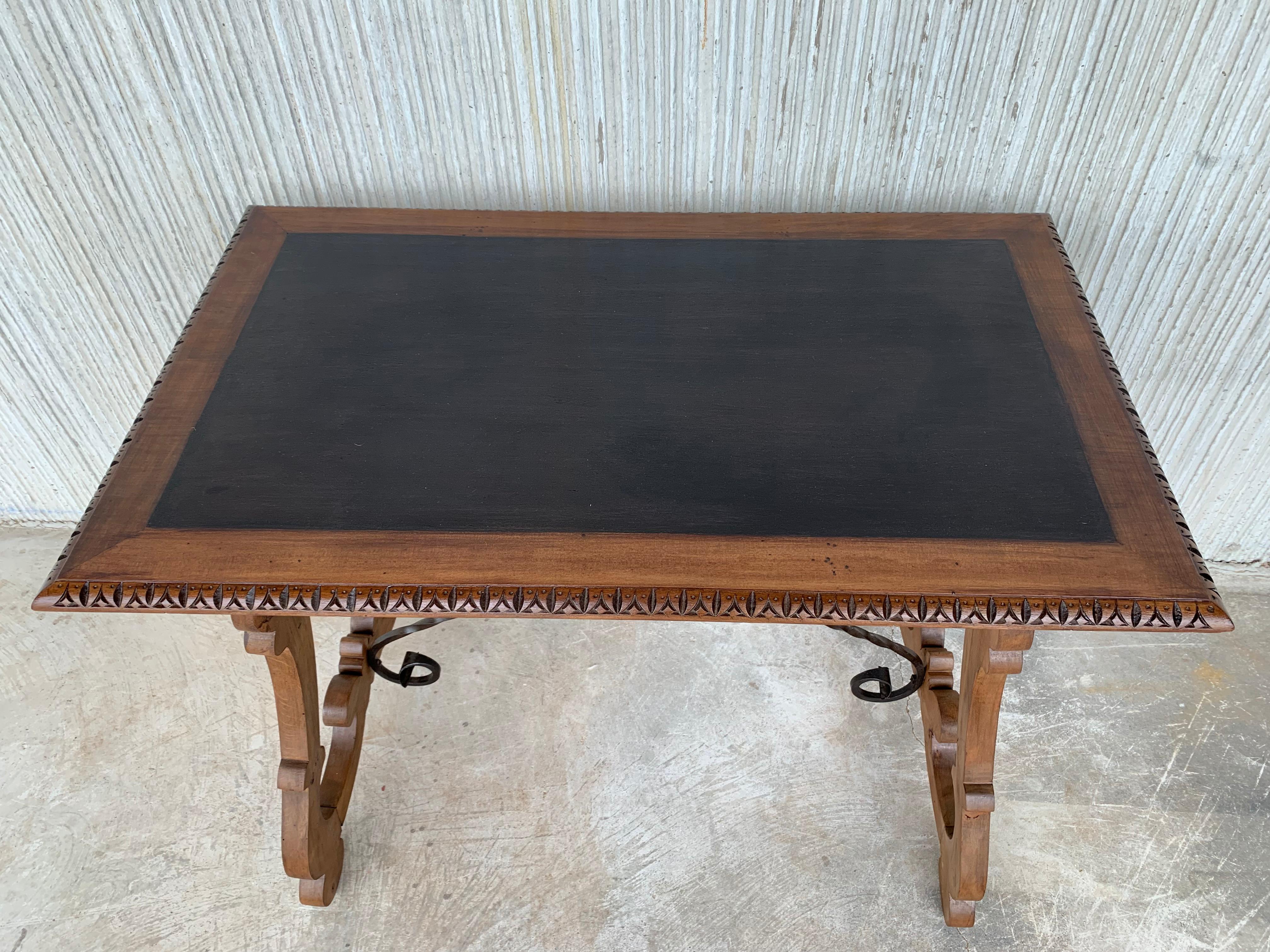 Spanish Farm Table with Iron Stretchers and Hand Carved Top and Ebonized In Good Condition In Miami, FL