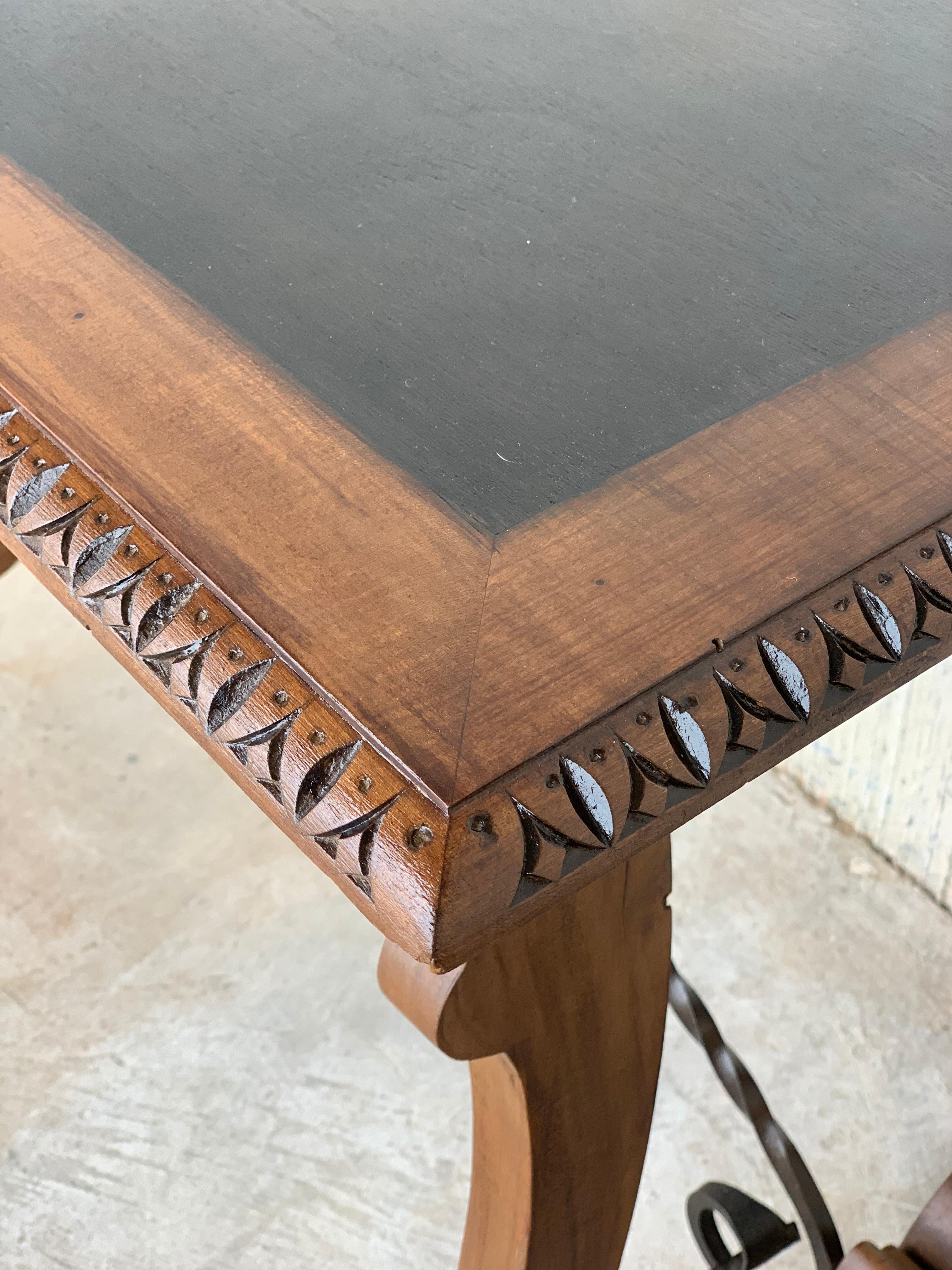 Spanish Farm Table with Iron Stretchers and Hand Carved Top and Ebonized 3