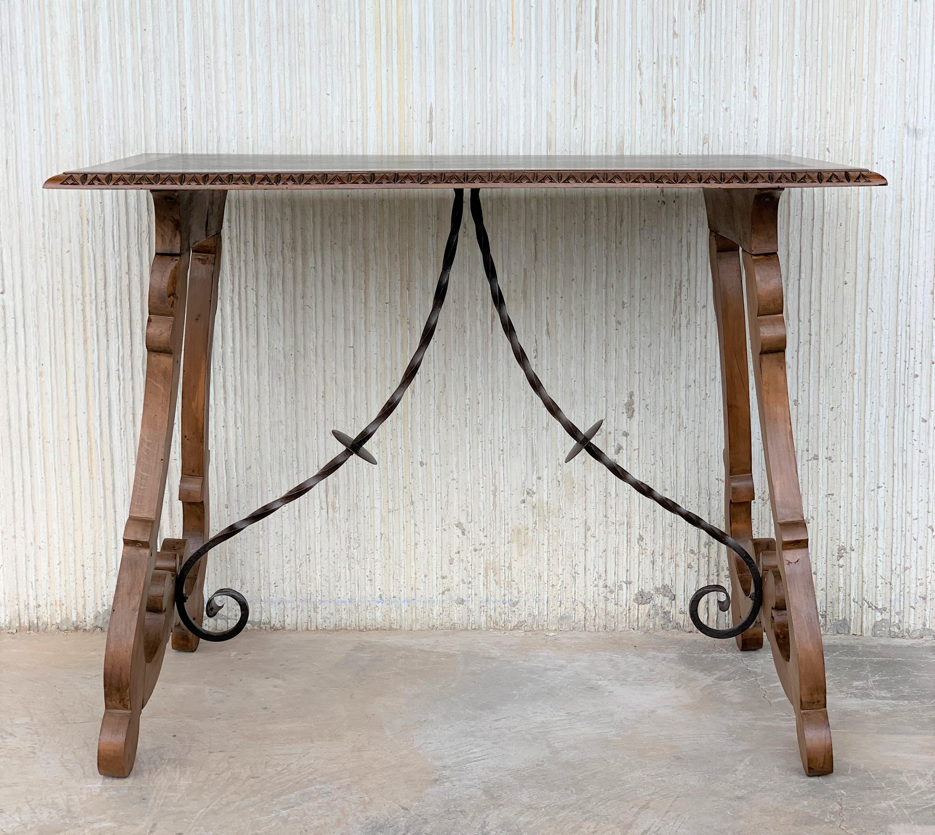 19th Spanish farm table with iron stretchers
Hand carved top
Completely restored.
