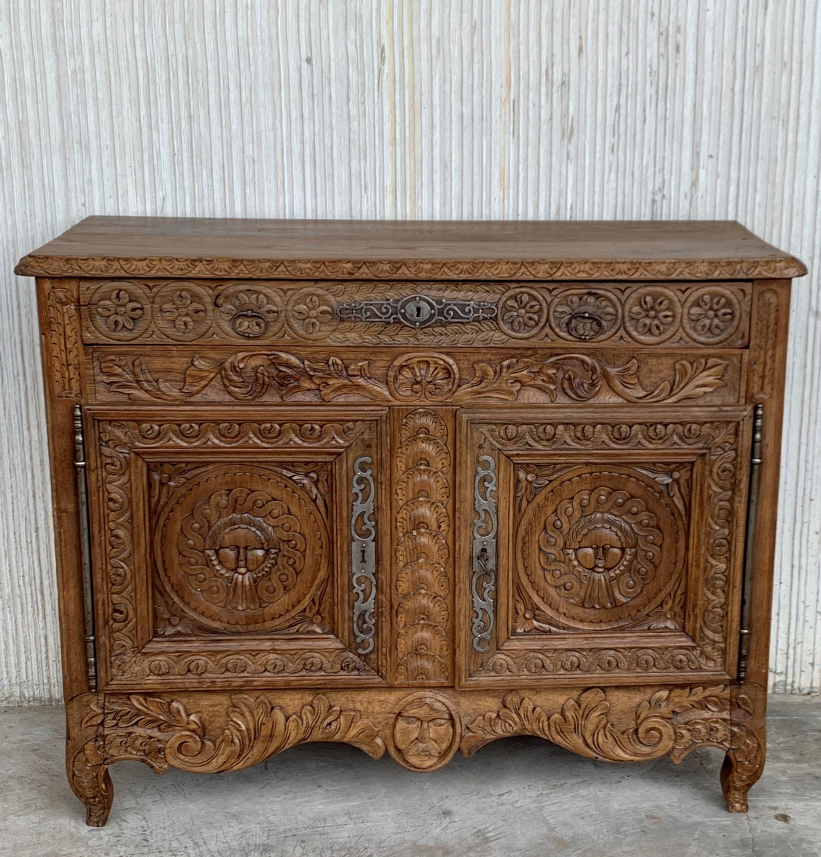 19th century Spanish hand carved Baroque oak cabinet with two drawers and two doors

Really beautiful piece.

Sideboard, cupboard, and console.