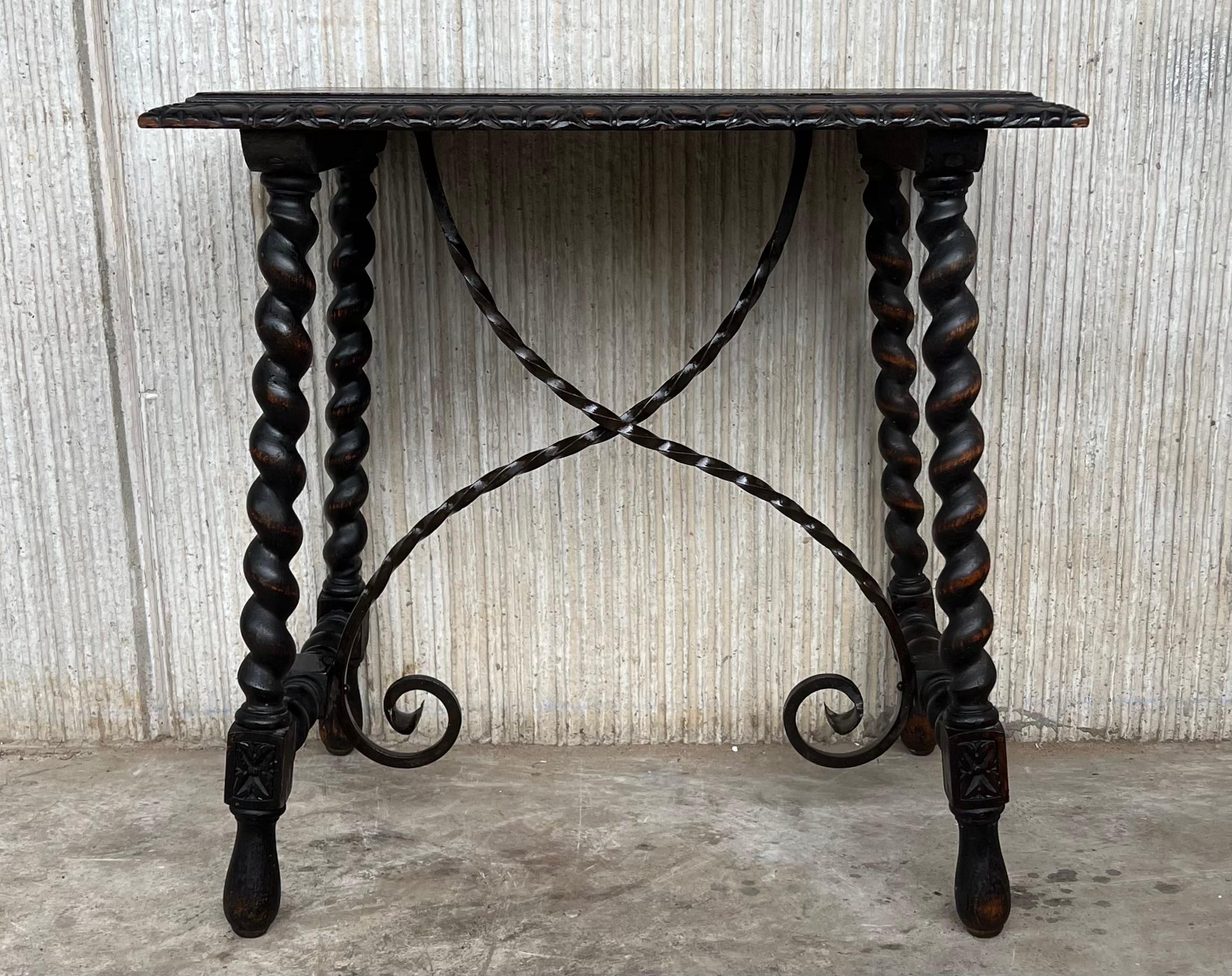19th Century Spanish side table with beautiful and rare iron stretcher. The rectangular top has carved edges, the end legs has a beautiful Solomonic carved.
The measure is very rare because you can use like a side table, end table, sofa table or