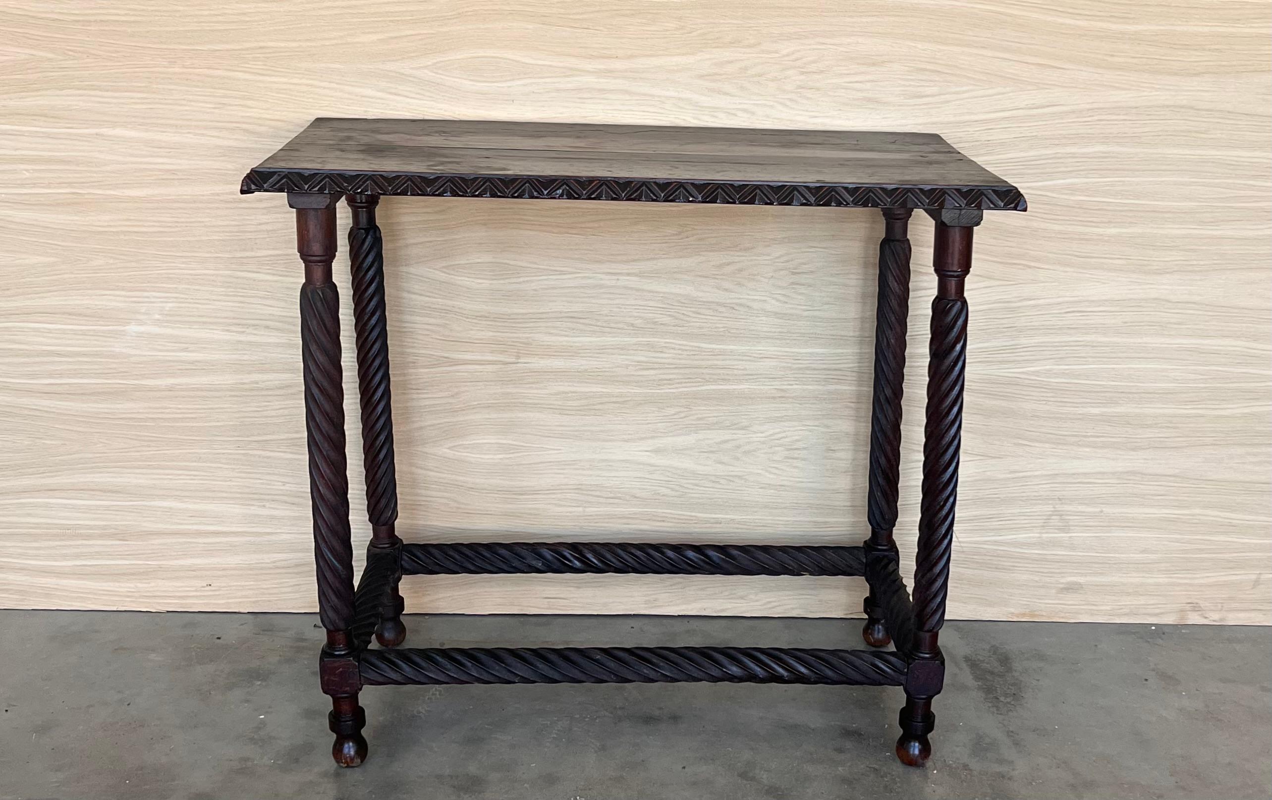 19th Spanish side table with cared Solomonic turned legs and carved edges in top
