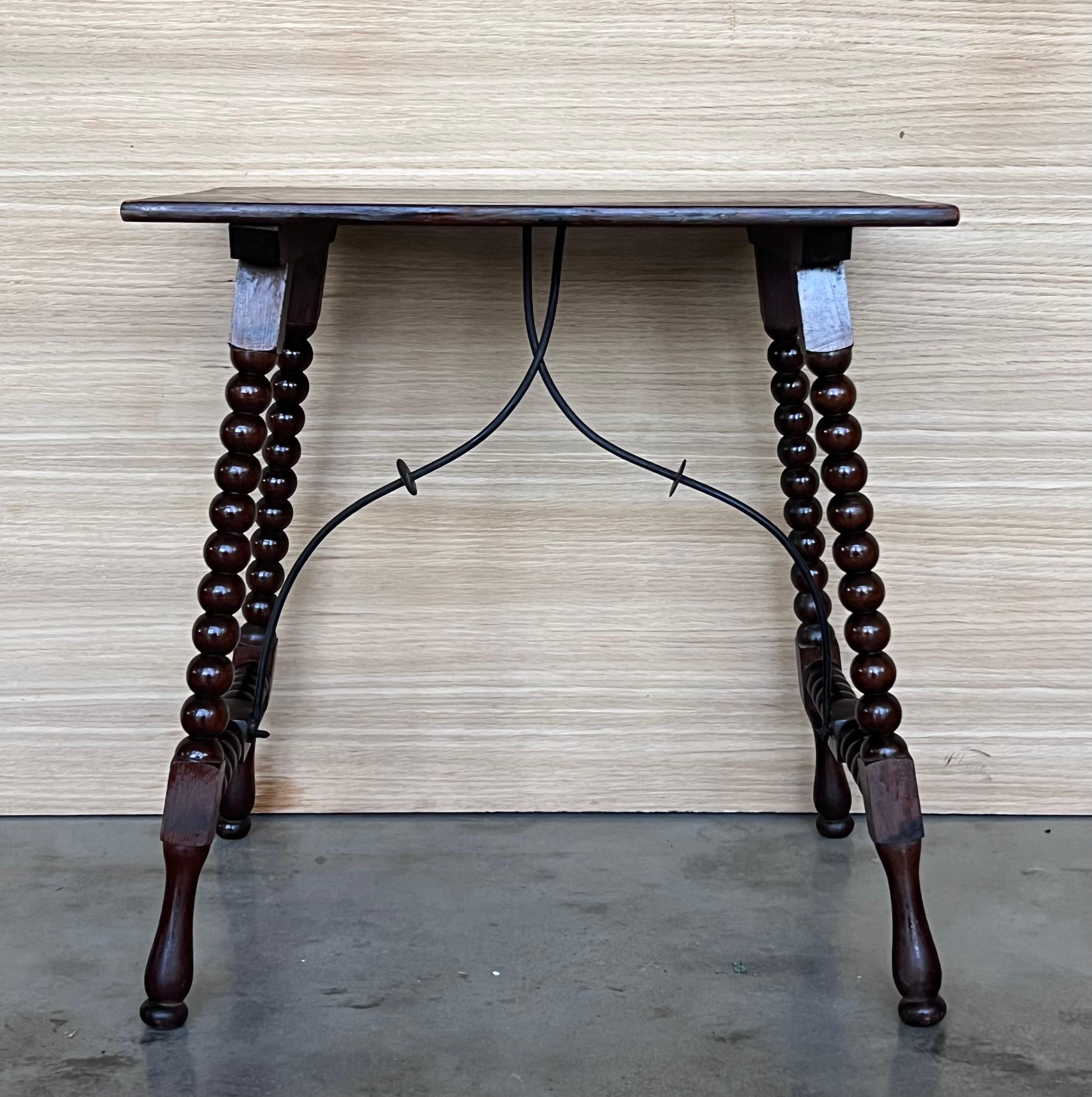 Baroque 19th Spanish Side Table with Cared Turned Legs and Iron Stretcher For Sale
