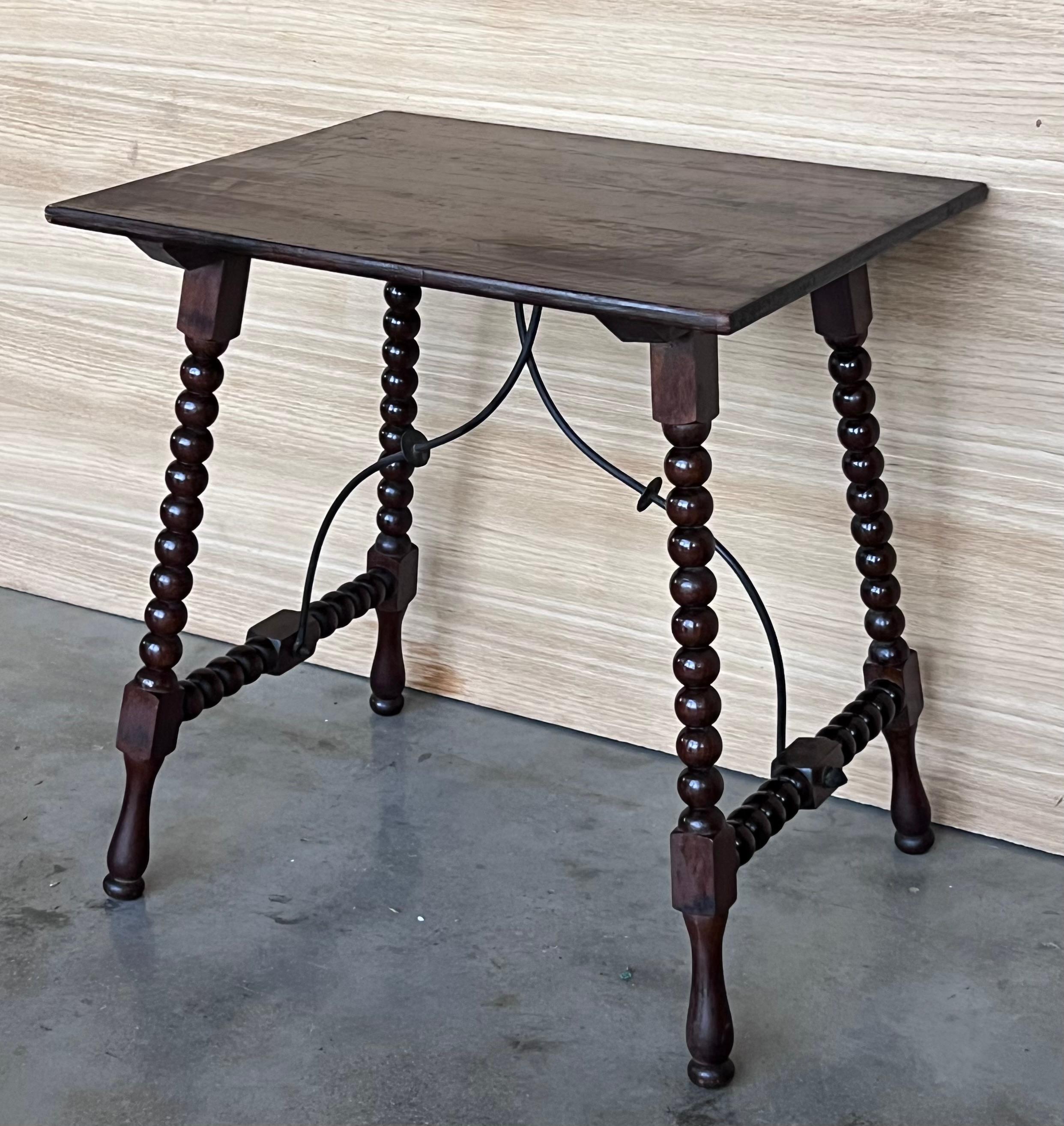 19th Century 19th Spanish Side Table with Cared Turned Legs and Iron Stretcher For Sale
