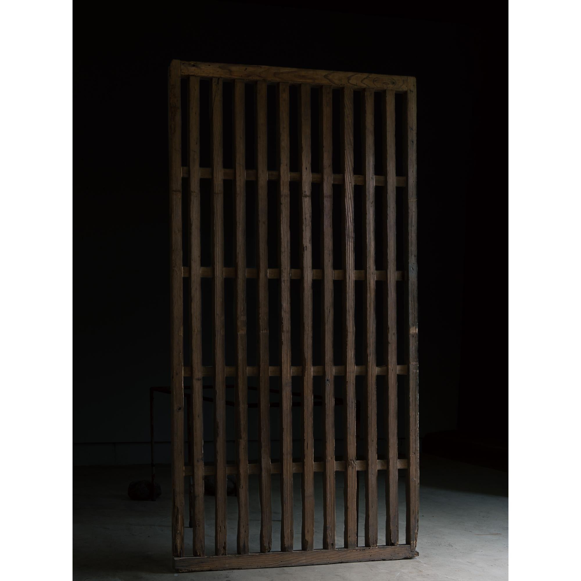 Japanese antique thick lattice sliding door, ara-koshido.
Edo to Meiji period circa 1870s to early 1900s.

Nowadays it's getting harder & more rare to find a sliding door with thick, strong lattices like this.
thickness of each vertical lumbers are