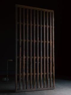 1860s-90s wabi sabi Japanese thick black sliding lattice door, exterior door