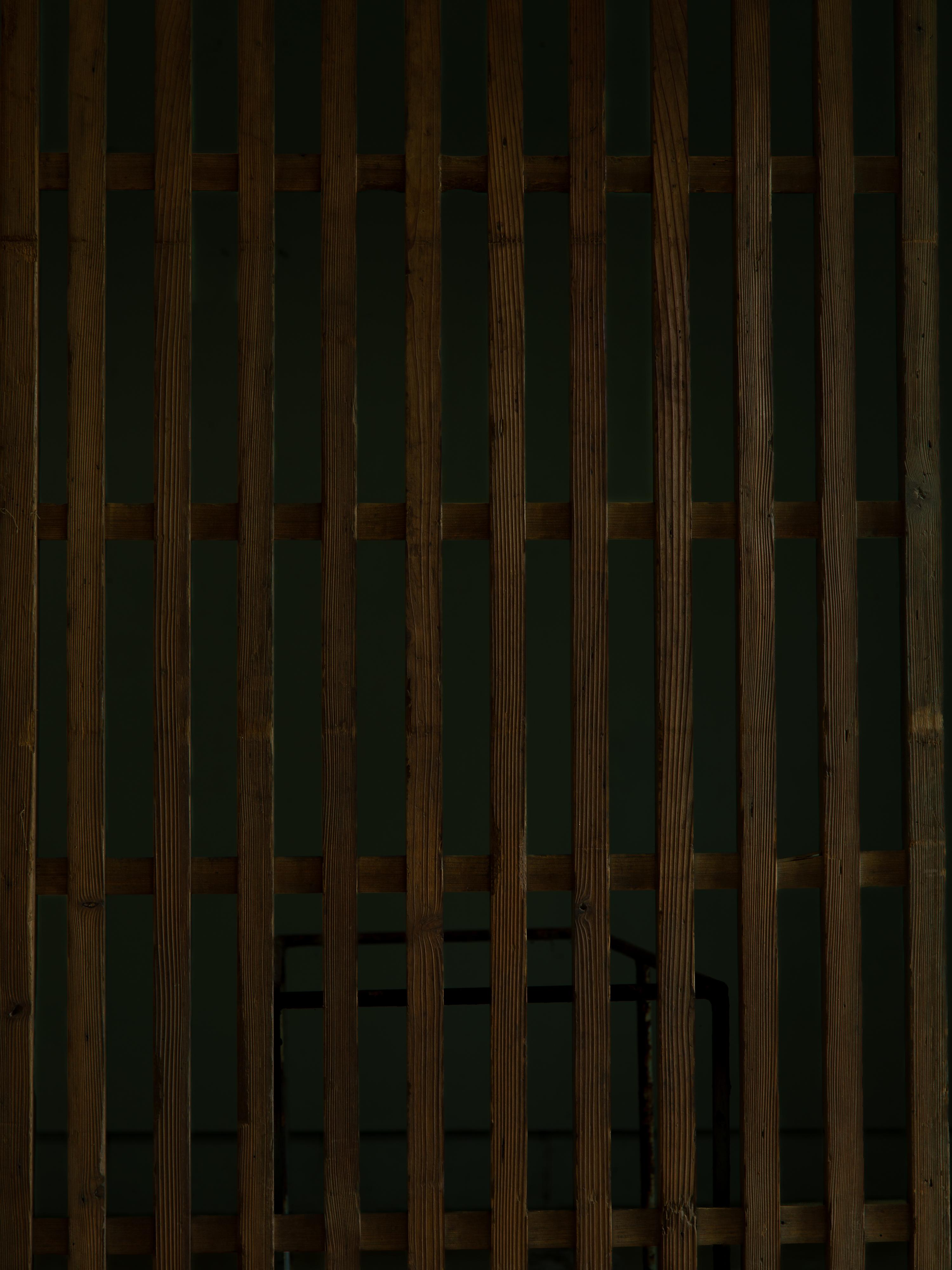 Legno 1860s-90s wabi sabi Japanese thick black sliding lattice door, exterior door in vendita