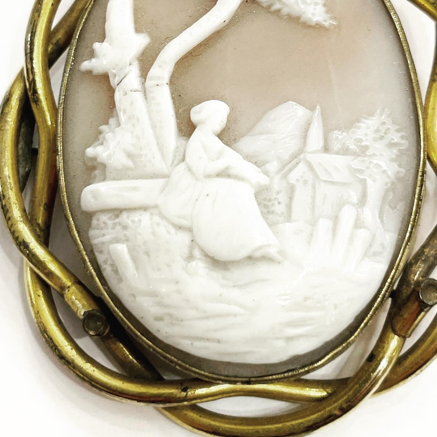 An amazing antique cameo brooch featuring a nicely carved shell bucolic scene. 
The frame is made of 9k gold.

Total weight of the jewel: 23.47 g.
Measures: 5.5 x 4.5 cm.
An antique lead welding (see pictures).

FREE SHIPPING.
RETURNS ACCEPTED (3