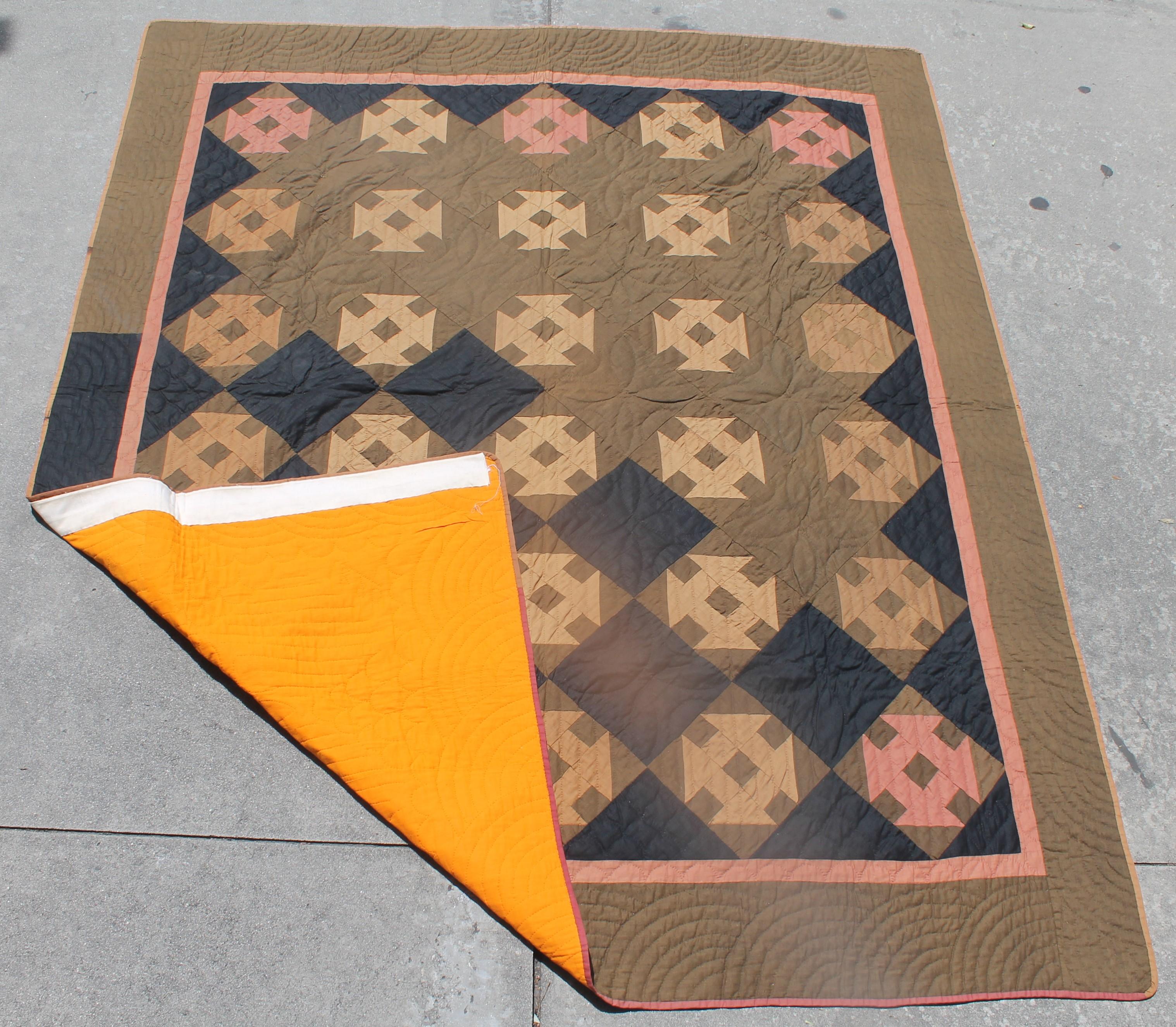 19th century very rare Holmes county Ohio Amish hole in the barn door quilt. This early and very rare all cotton quilt has a cheddar backing and very interesting color combo. The condition is pristine. This fine quilted quilt is dated 1890 in two