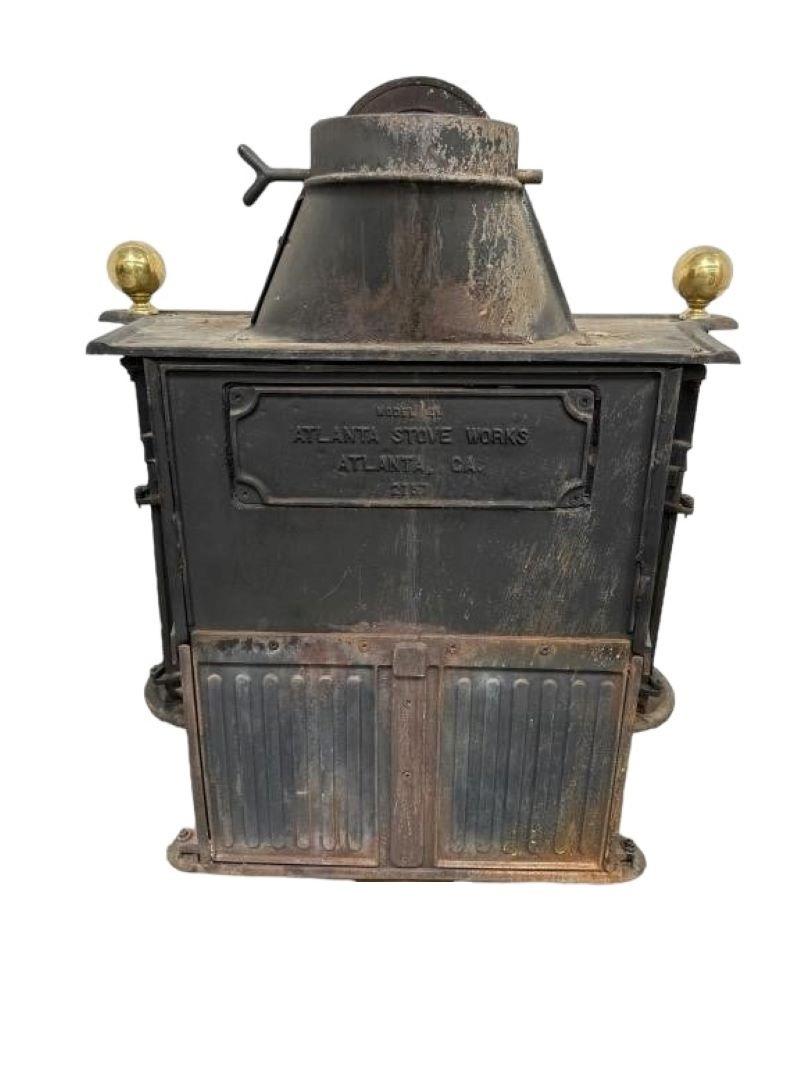 19thc Antique Iron Wood Burning Stove. Outdoor Fire place measures 38.5w x 28d x 29
